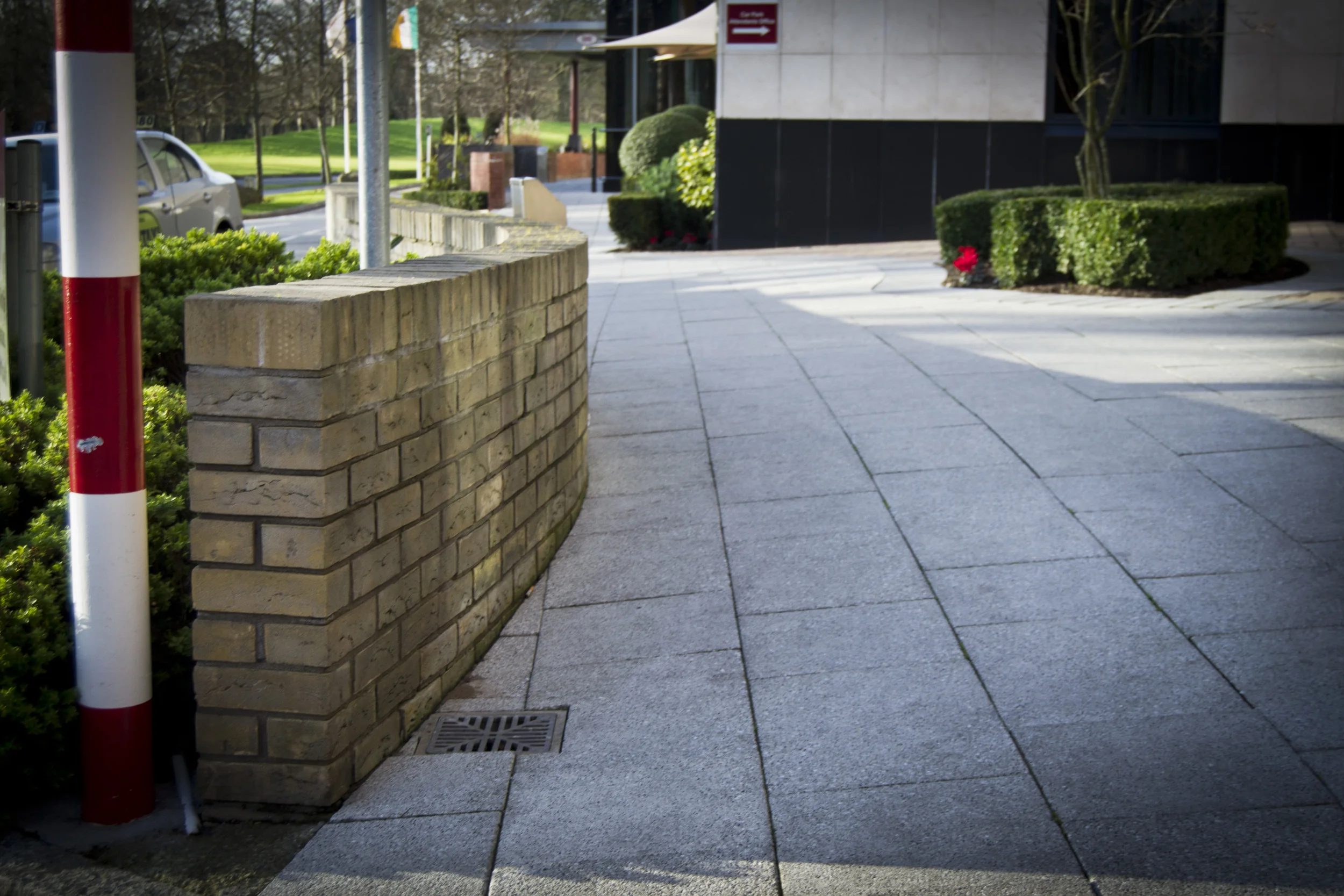 Curved brick wall