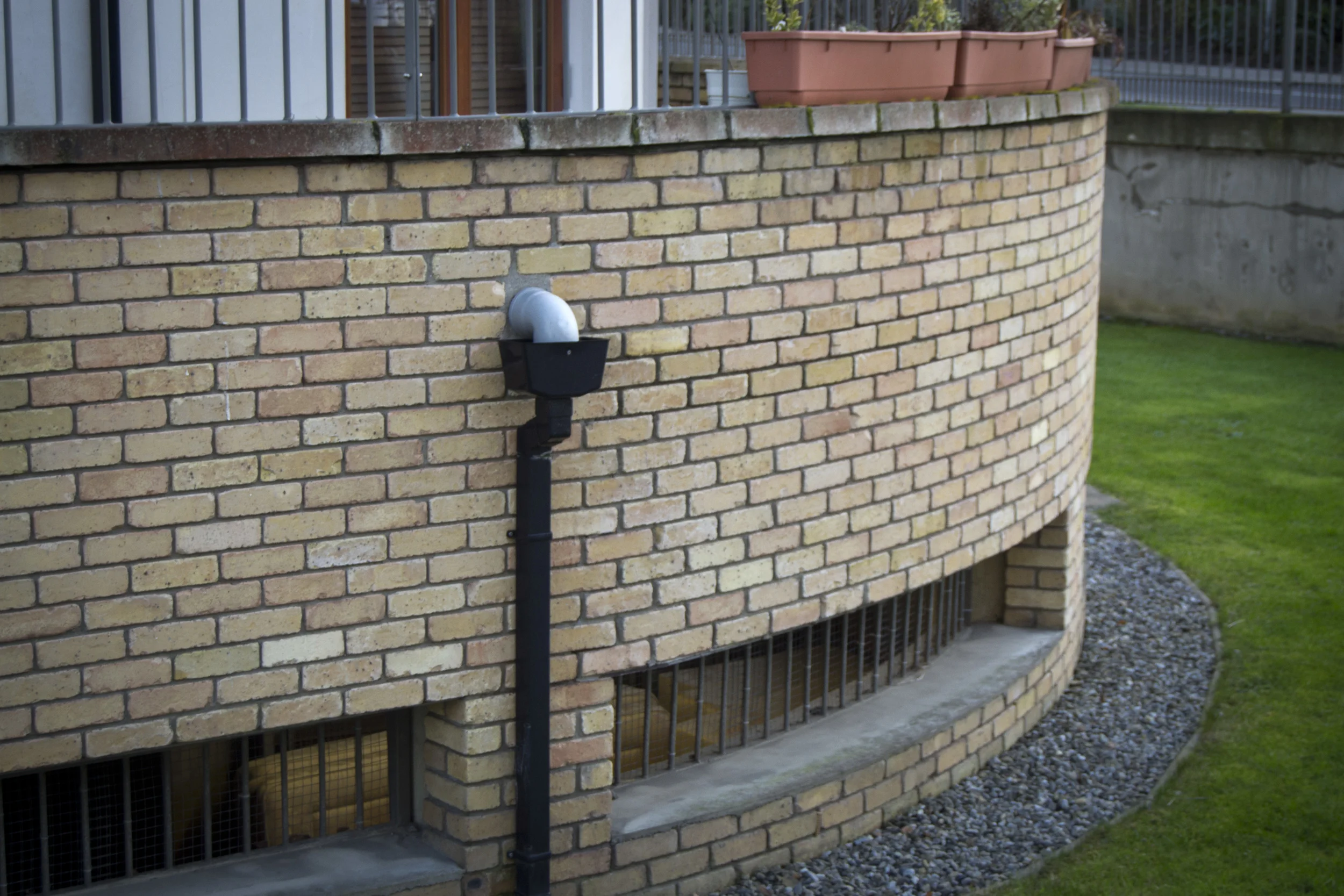 Curved brick wall
