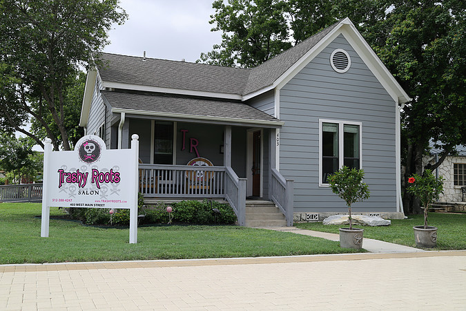 Retail Spotlight: DevaCurl. Seven years ago Trashy Roots was one of the first salons in the area to carry DevaCurl. They haven’t looked back since! All stylists at the salon are Deva certified. Curly-haired ladies are extra loyal to both the salon and the products that make their hair look fab. Between the Devalcurl website and www.naturallycurly.com there is a constant influx of new clients to the salon. Trashy Roots gives back! Anna works closely with The Texas Baptist Children's Home doing donation drives several times a year, with all of the profits from the recycling program going directly to them. When the Texas Baptist Children’s Home has a need, Trashy Roots bands together with their client community to help. Anna has developed a recognizable brand. From the website to social media, logo, and salon décor Anna has created a brand that is truly her. It’s cohesive and it’s reflective of her. She’s built a brand from the heart and it shows on every level. 