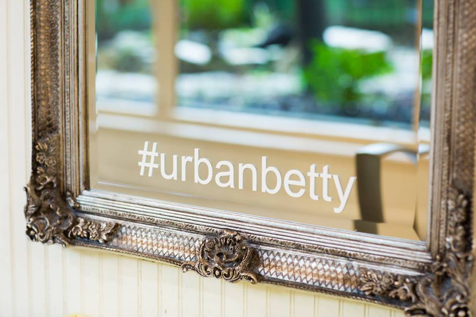 Spotlight on Urban Betty Owner Chelle Neff and Armstrong McCall North Austin go way back. When Chelle first started out after finishing her cosmetology license in high school she worked for AmCo in one of our stores! I was so thrilled to hear we were a small part of her journey. She has been moving and shaking ever since. Urban Betty has a giant list of awards and accolades, but my favorite part of chatting with Chelle is her amazing energy. She shares her philosophy of always giving back within her community, and uses her business as a platform to inspire others to do the same. This year marks the 8th annual clothing swap benefitting Safe Place! Not only does this create awareness for Safe Place ( http://www.safeaustin.org ), but it involves her staff and community in a really fun and unique way.