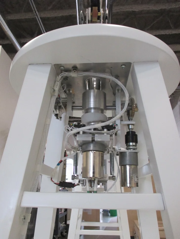  Wheel spinning and fork tilting mechanism, under stool seat. 