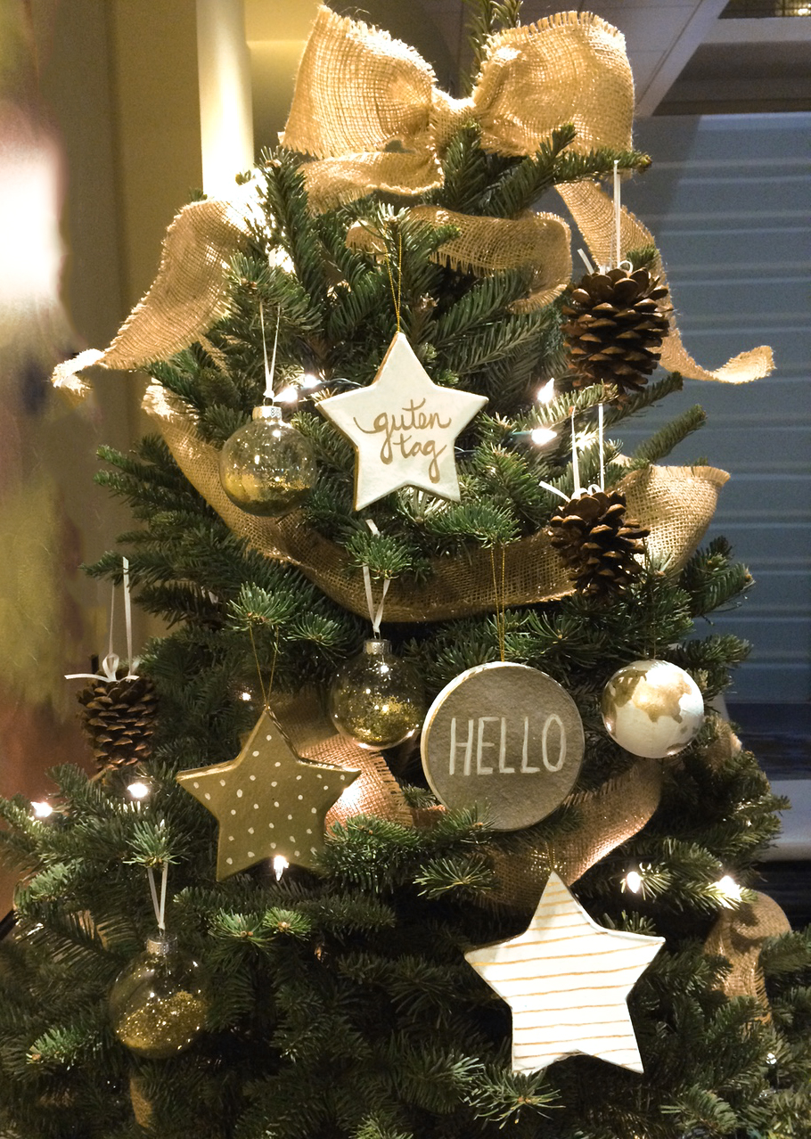 Cadence employees spent a day crafting handmade globe, pinecone and "Hello" ornaments for the charity.