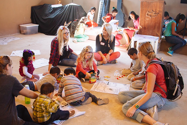 Volunteers host activities for the local children.