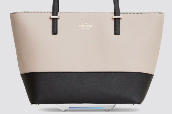 Charge your cell phone with your Kate Spade bag when you're on the go