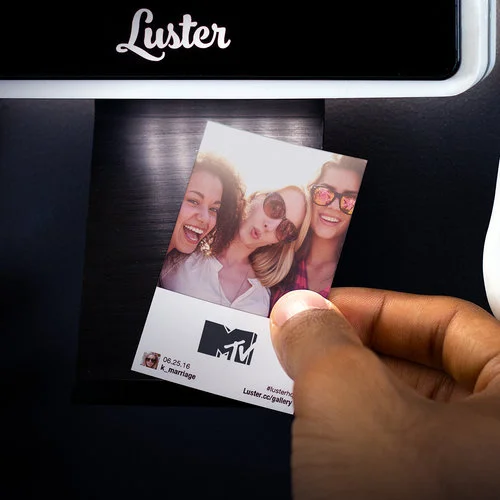 Have your attendees print event photos by hashtagging their selfies