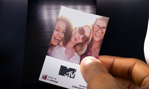 Have your attendees print event photos by hashtagging their selfies