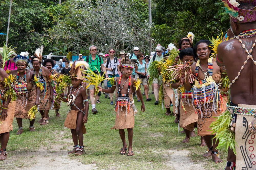 Papua New Guinea_Guest escorted by the locals while entering to Jako village Vanimo .jpg
