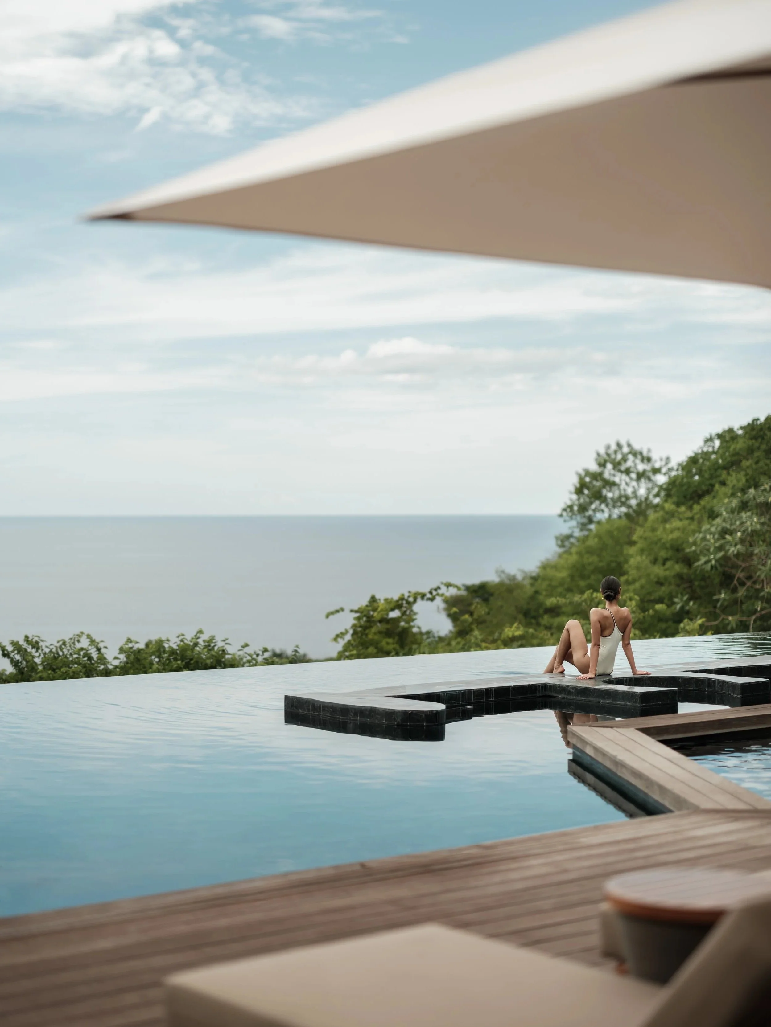 Woman+Relaxing+Private+Pool.jpg