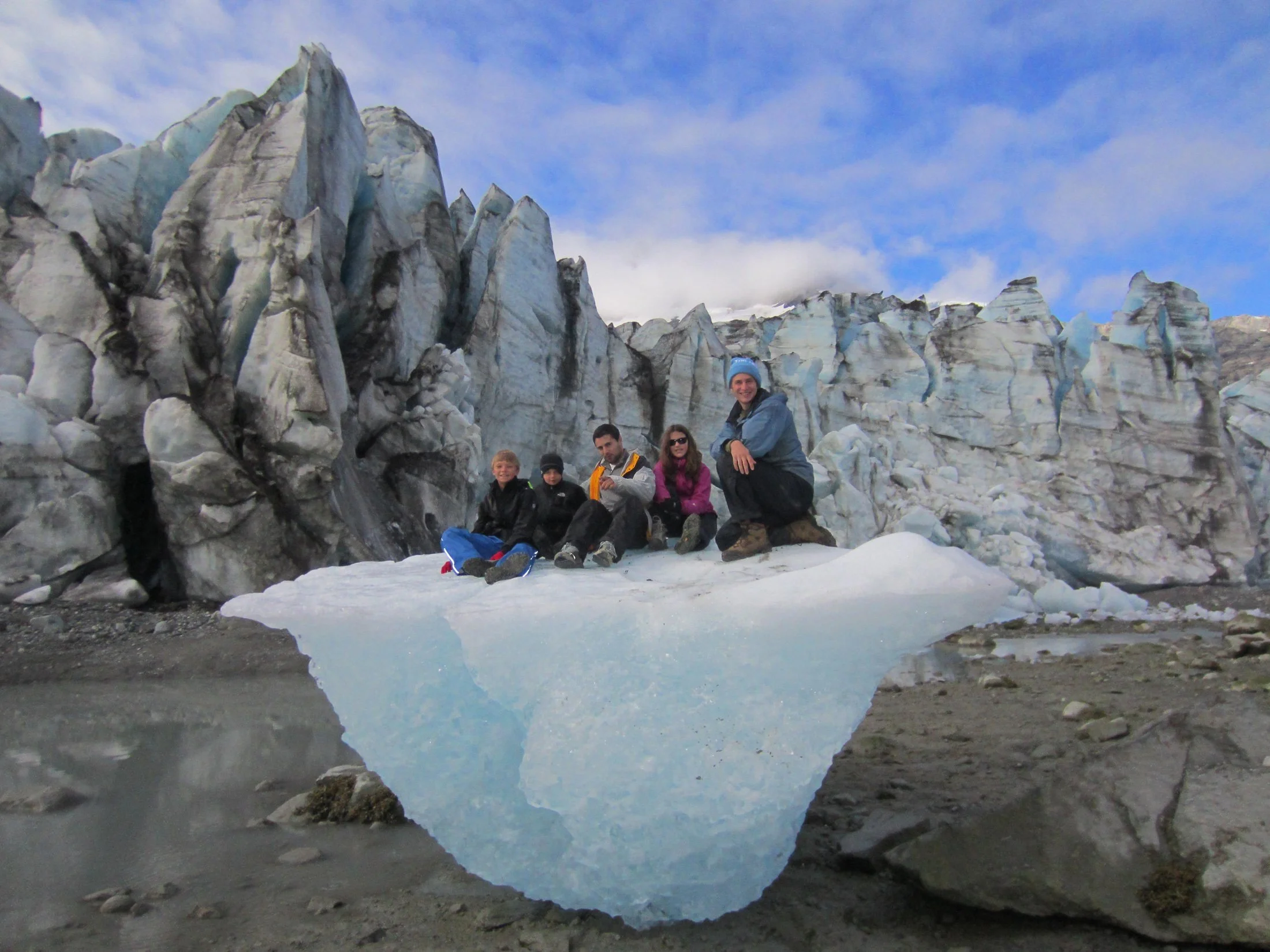 Family - Family on ice in front of glacier.jpeg