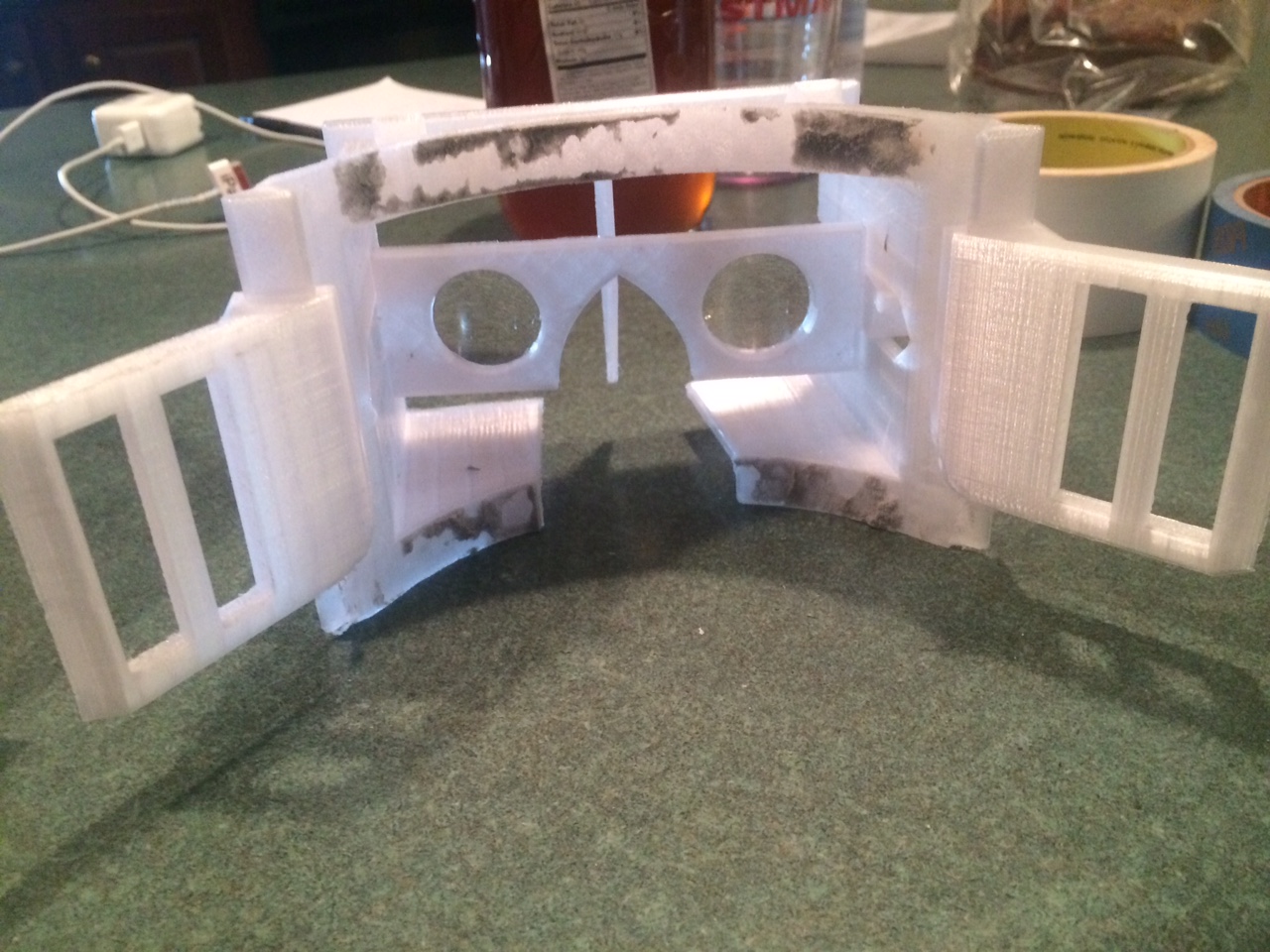 What the headset look liked from the back before spray painting. I accidentally put weathering strip on before realized I needed to darken the inside(oops!).
