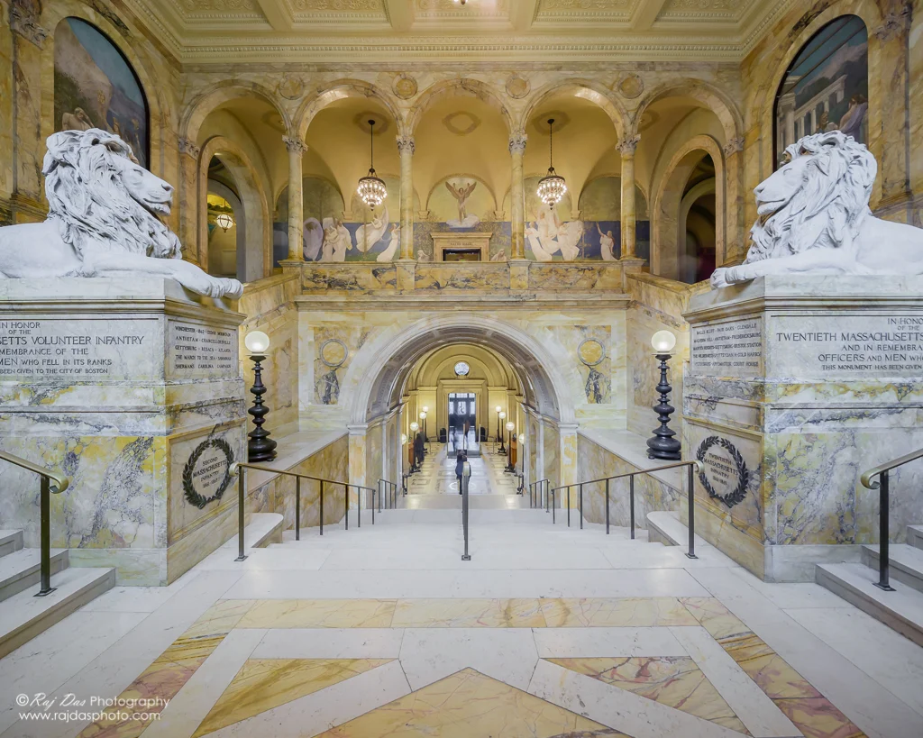 The main entrance staircase to the McKim Building with the twin statues of lions, sculpted by artist Louis Saint-Gaudens.