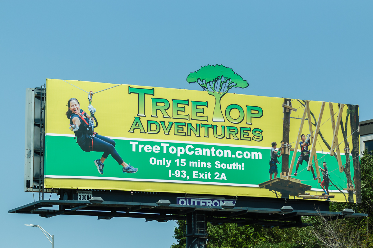 Closeup of the billboard on I-93N Exit 6 in Braintree, MA