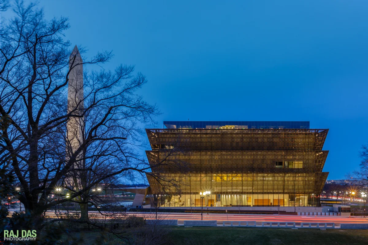 View of the Museum and the Washington Monument with the traffic on 14th Street at dawn