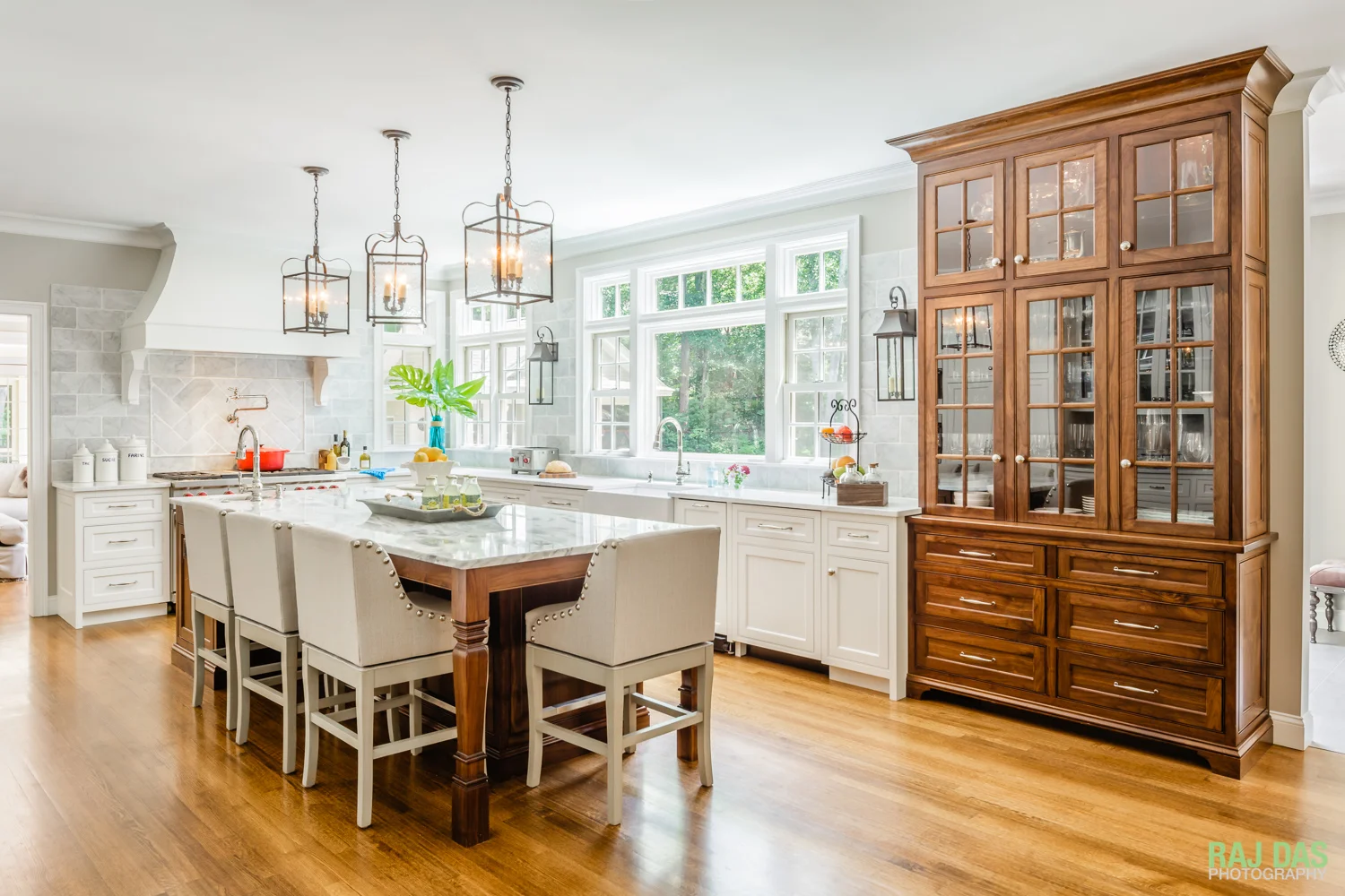 The lead image for the project showing the kitchen and the adjoining sections of the residence