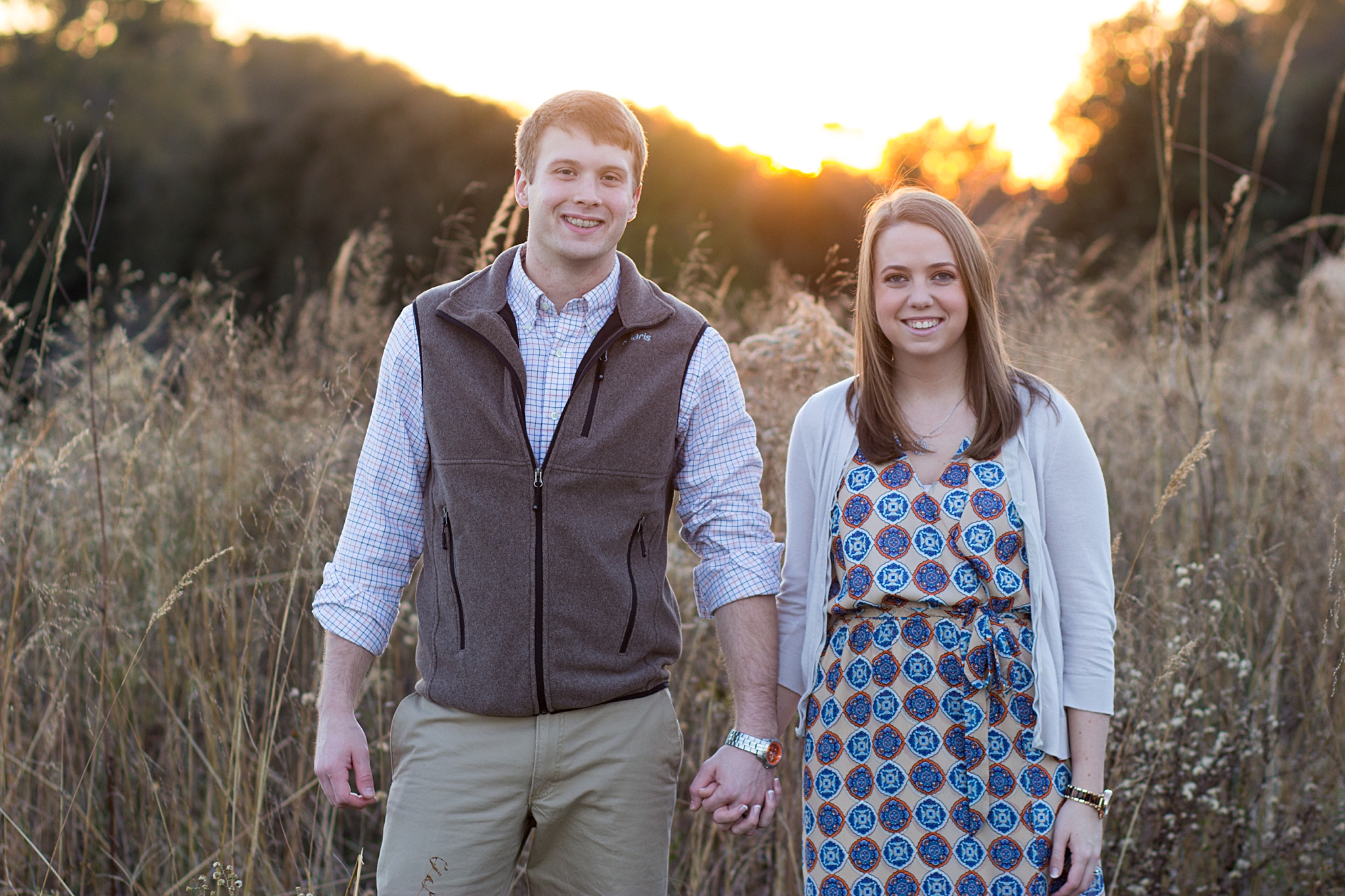 " Jenna did a wonderful job with our pictures!! Very flexible with scheduling and worked great with our very hyper puppy :) Would definitely recommend her great photography to anyone! Pictures turned out even better than I imagined. Thanks Jenna!!" -Hannah and Eric