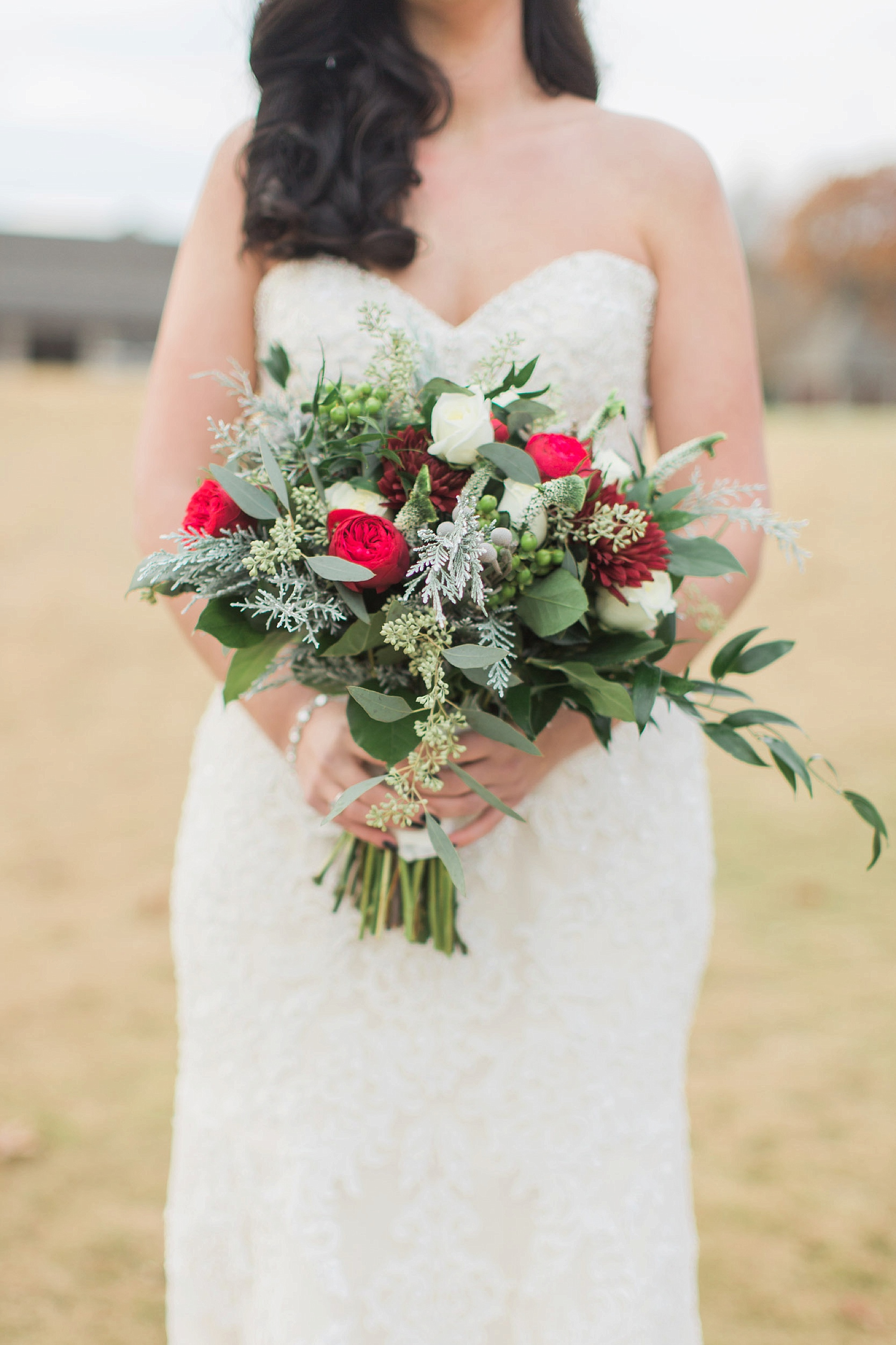 Red, white, and green wedding bouquet