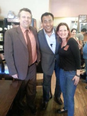 Rhonda and Jon Mallek, owners of The Fine Grind Coffee Bar, located on 101 Newark Pompton Turnpike, saw their business recently filmed for the reality program "What Would You Do?" hosted by John Quinones. Pictured are the Malleks and John Quinones.