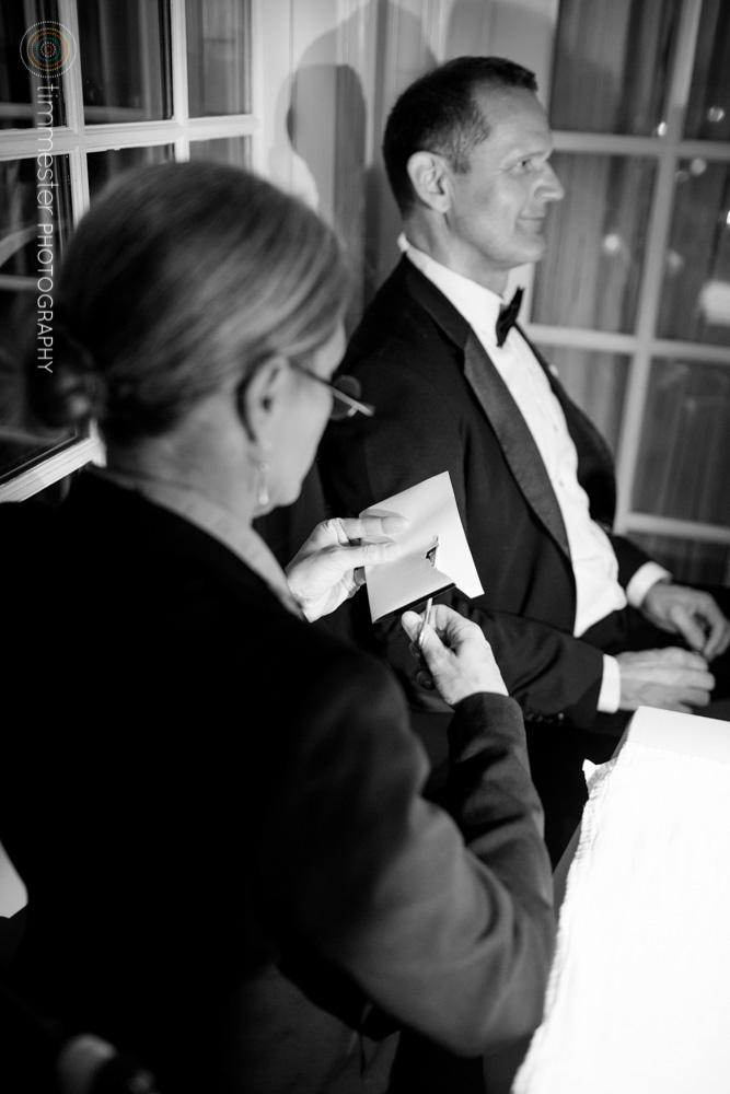 Lauren cuts a silhouette at a wedding event. See more event types on the Booking page.