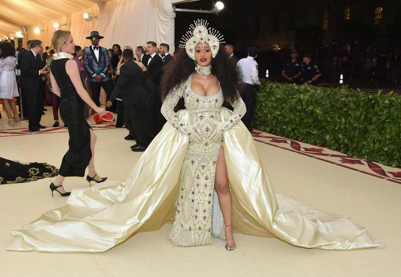 Cardi B wearing custom-made gown and headpiece by Jeremy Scott
