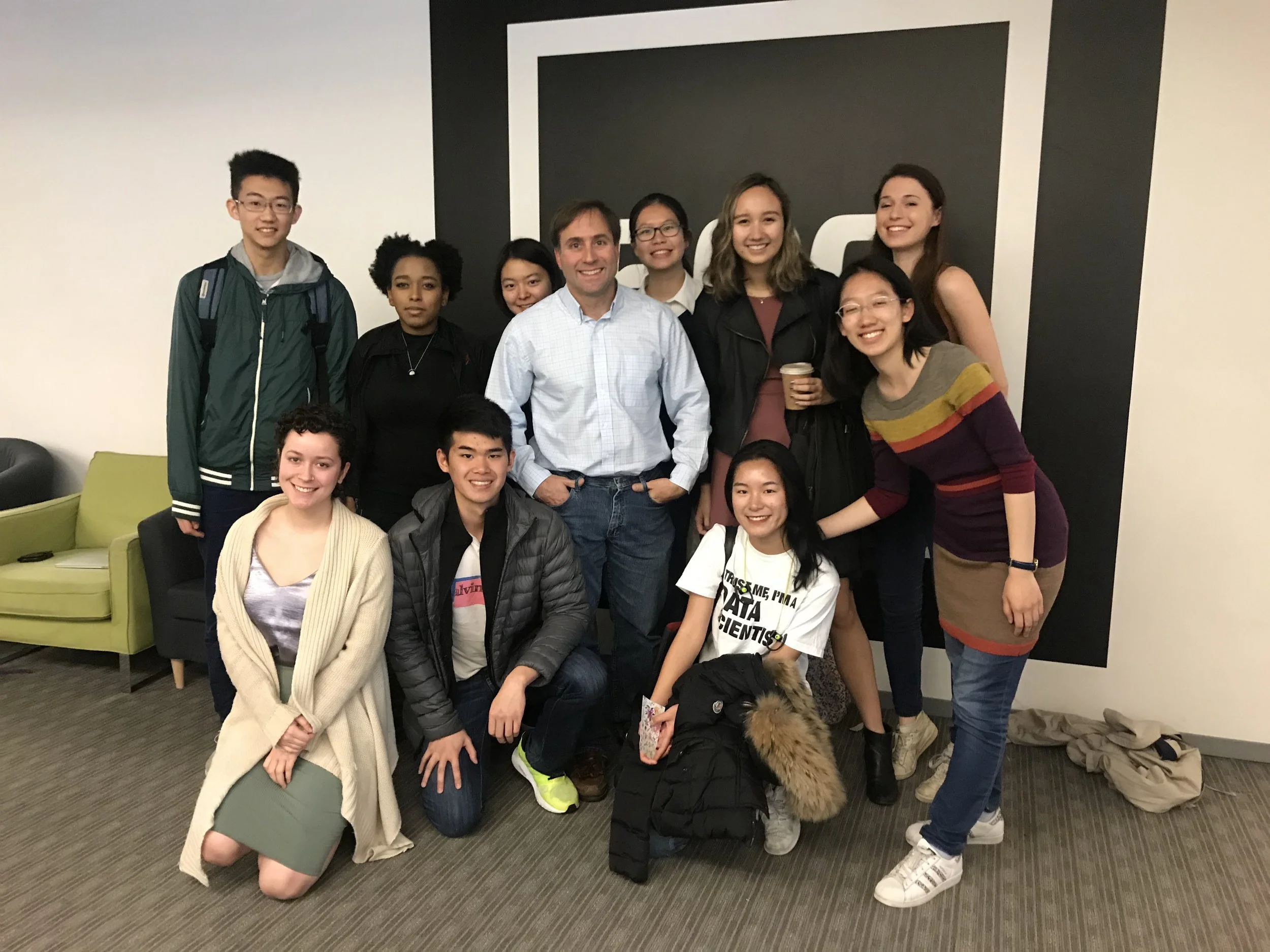 The team from Wes posing in front of the 500 Startups logo with Robert Neivert '90