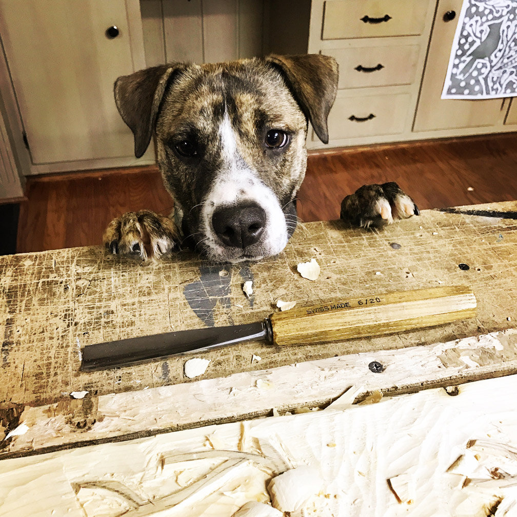  Tonk supervising the carving process. 