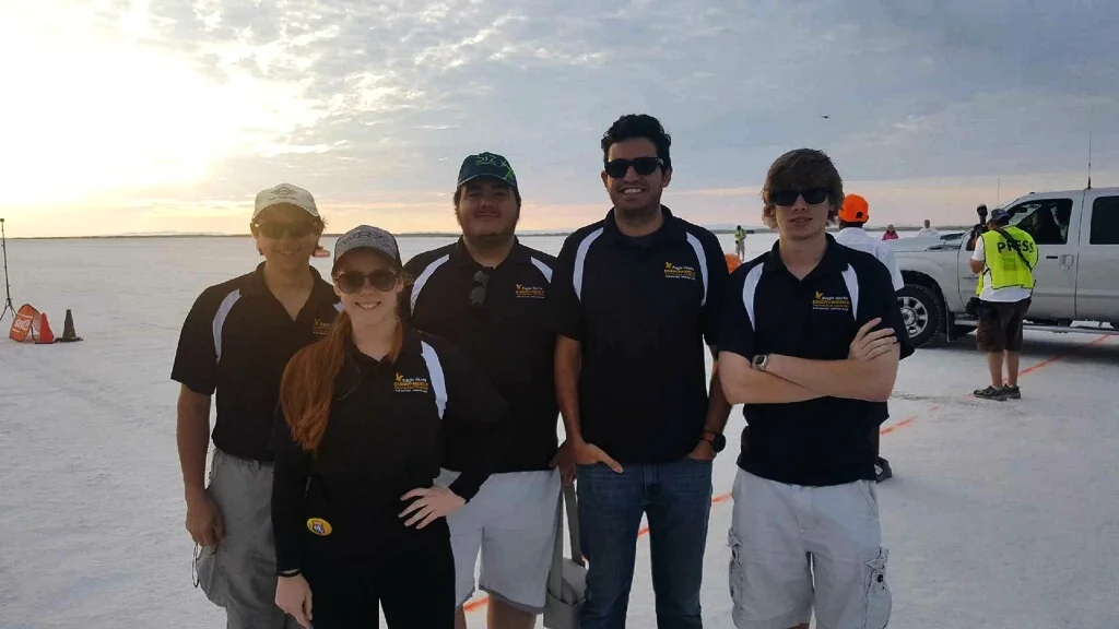 Eagle Works Interns at Bonneville Salt Flats From Left to Right: Johnathan Crossley, Team Member; Julia Mihaylov, Lead Cooling Engineer and Secretary; Sean Rager, Director of Research and Development; Reece Ticotin, President; Alexander Benz, Lead Steering Engineer.
