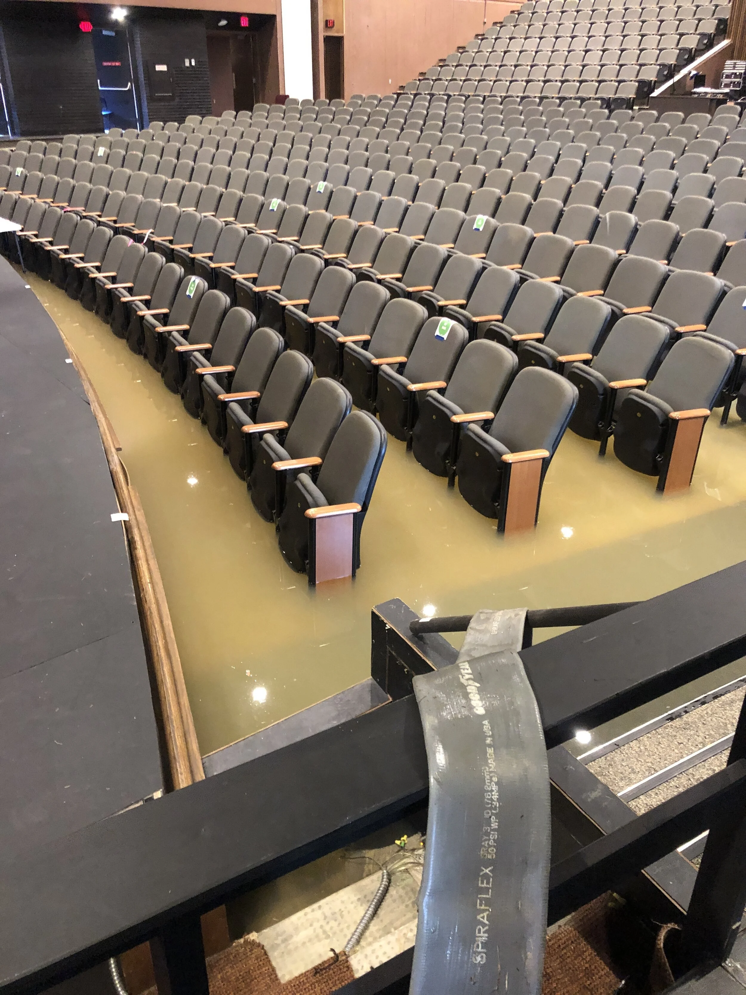   Auditorium floodwater upon arrival  