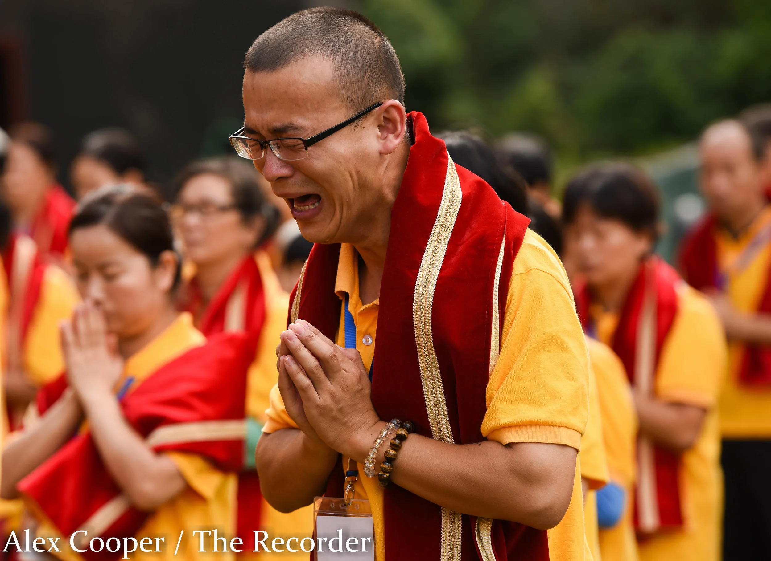 Alex Cooper / Recorder staff Qiao Huang, a native from China, cries vigorously during a Hungry Ghost Festival on Wednesday, August 17, at the Ephratah Villa. Through a translator, Huang said he was very emotional because he could see many spirits ar…