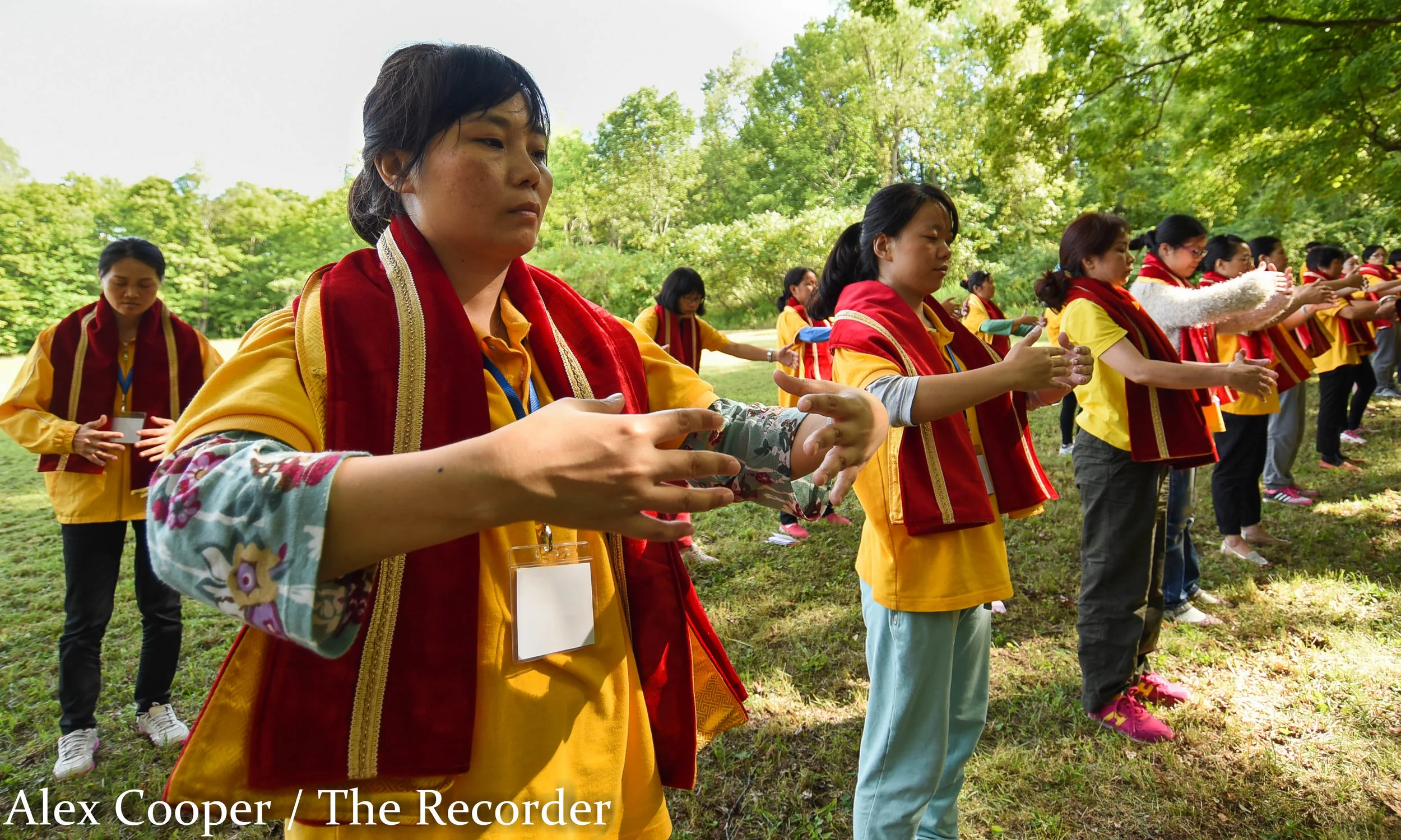 Alex Cooper / Recorder staff Students participate in supreme yoga before the start of a soul relieving ceremony on Wednesday, August 17, at the Ephratah Villa. Those involved in the The Guang Huan Mi Zong Health Dharma Course come from many location…