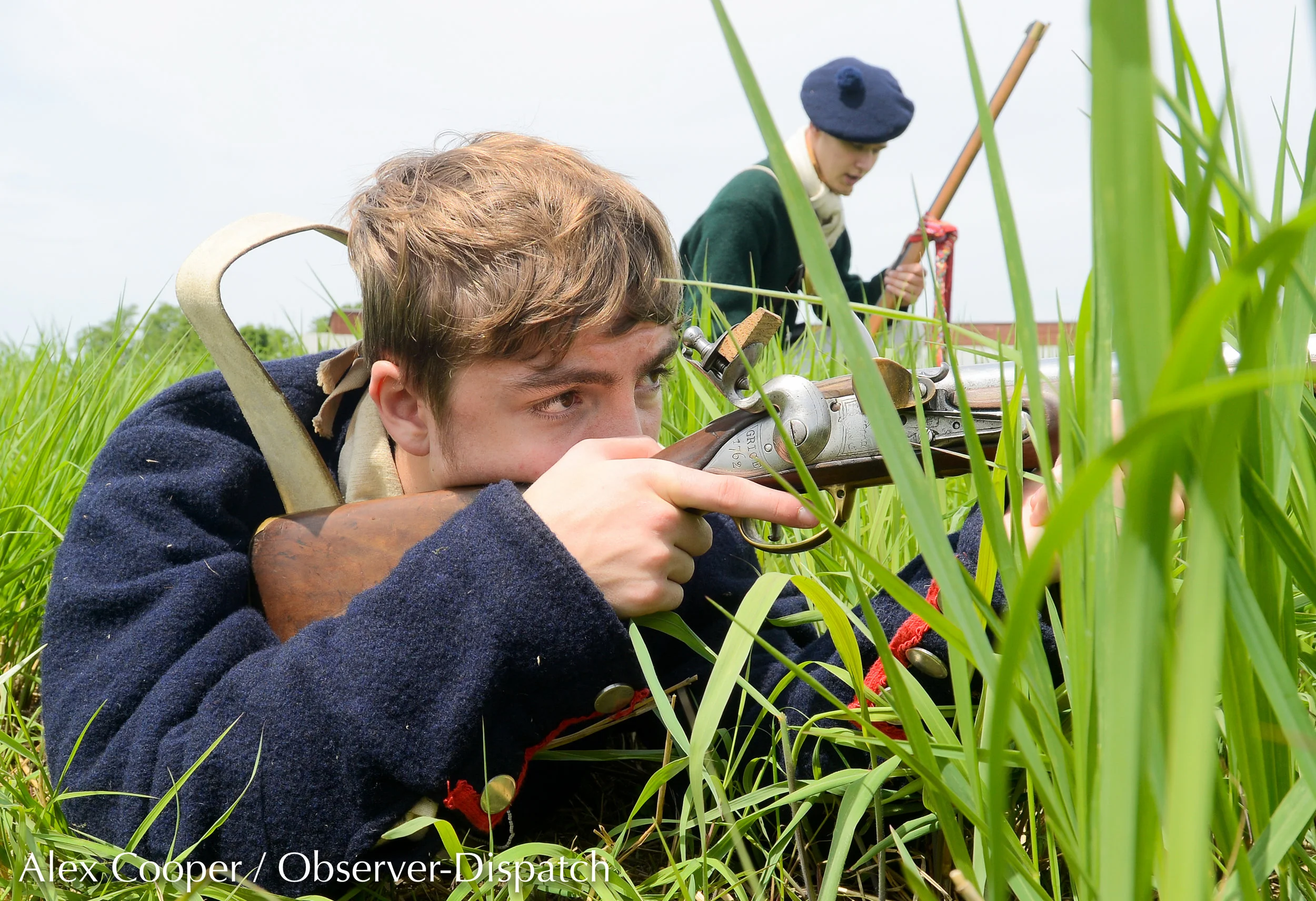 Johann Bratge, a 9th grade student at Westmoreland High School, aims down the barrel of a non-loaded musket during a practice assault on Fort Stanwix on Saturday, June 9, 2018, at the Fort Stanwix National Monument in Rome. Bratge, along with other …