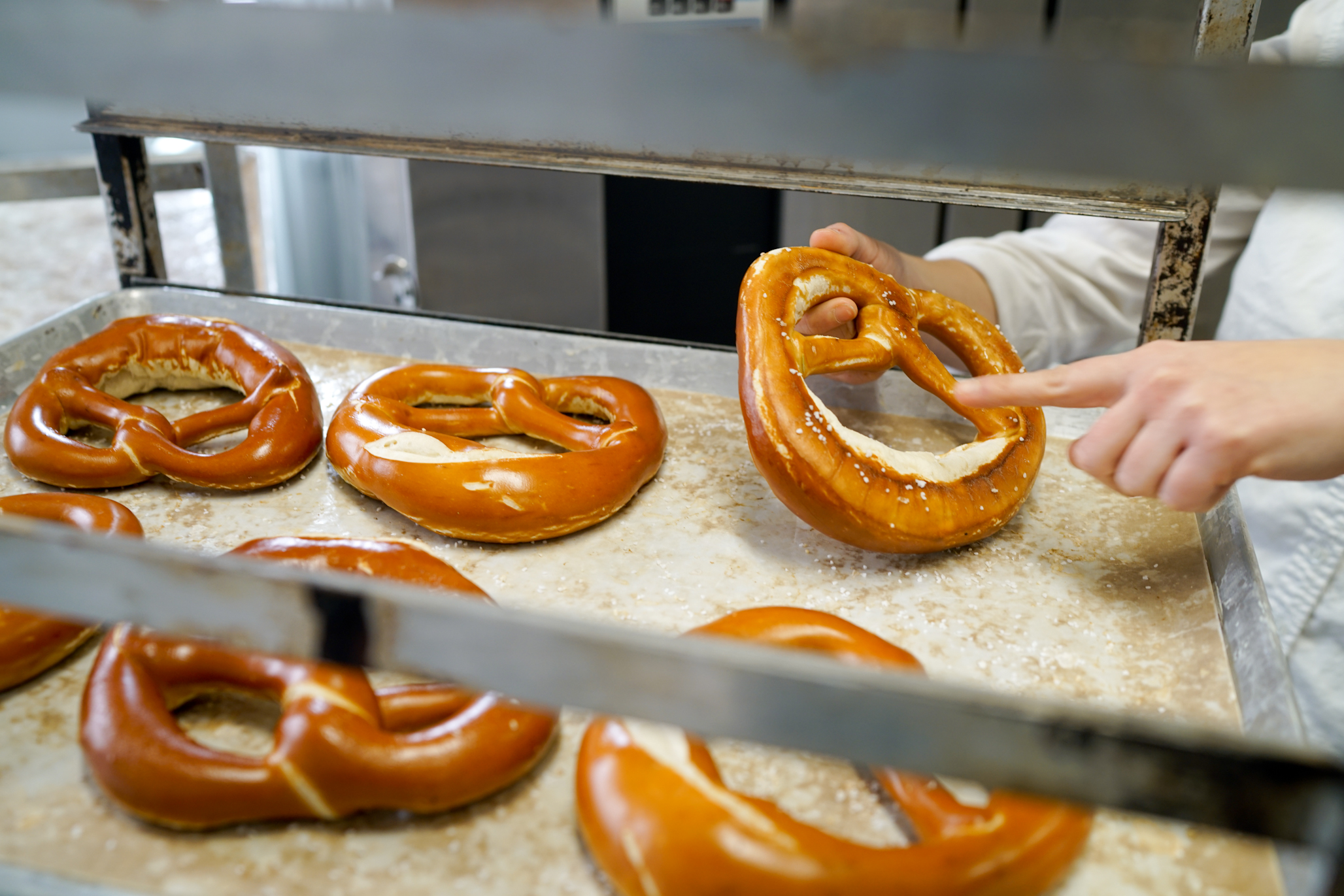 Every pretzel made at the Bronx Baking Co. is finished by hand by one of the company’s trained bakers. “I can’t figure out how to take the hands out of the process and maintain the quality, so it will be done like this forever.” - Alexis Faraci, founder and owner of the Bronx Baking Co.