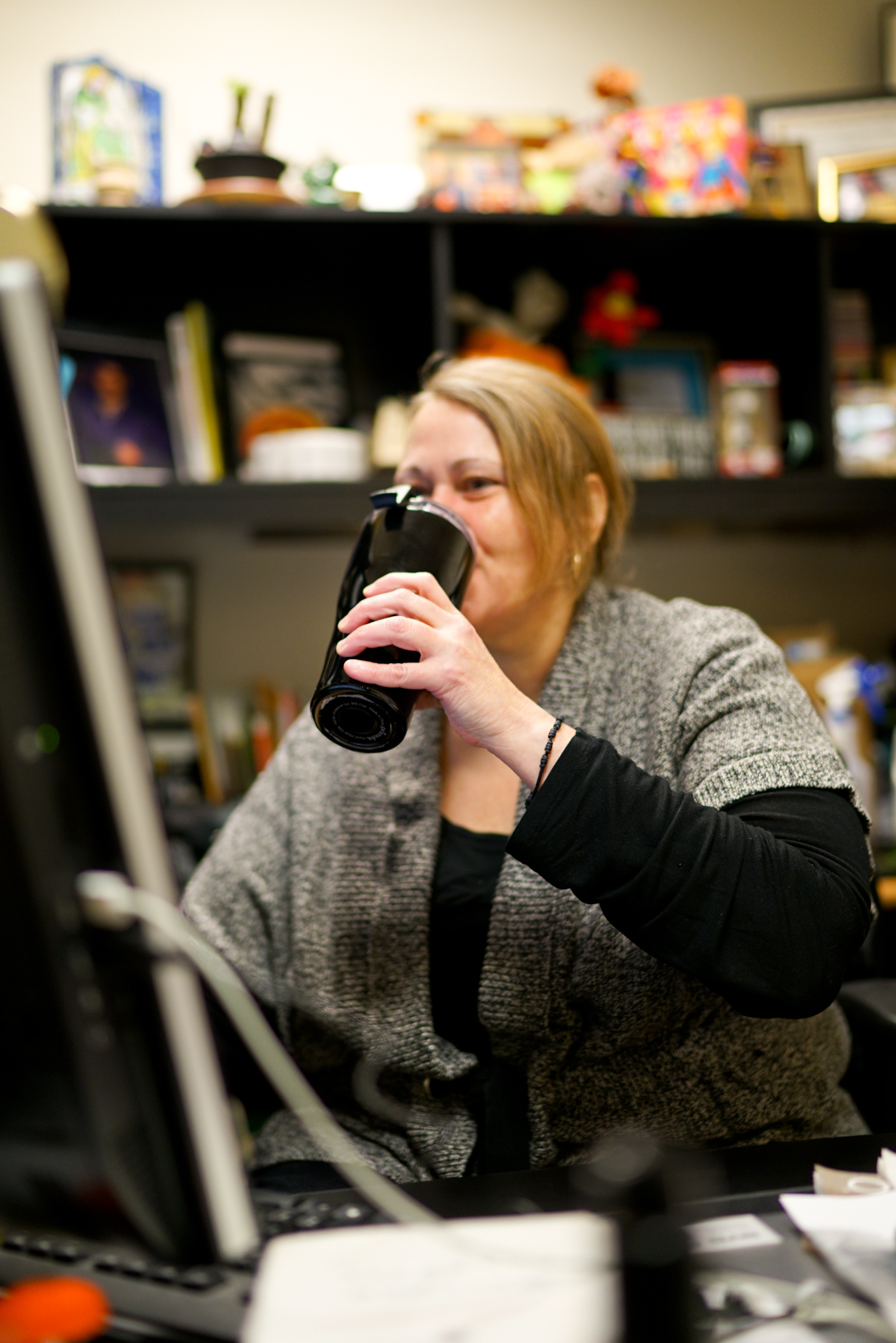 Dawn drinking her coffee