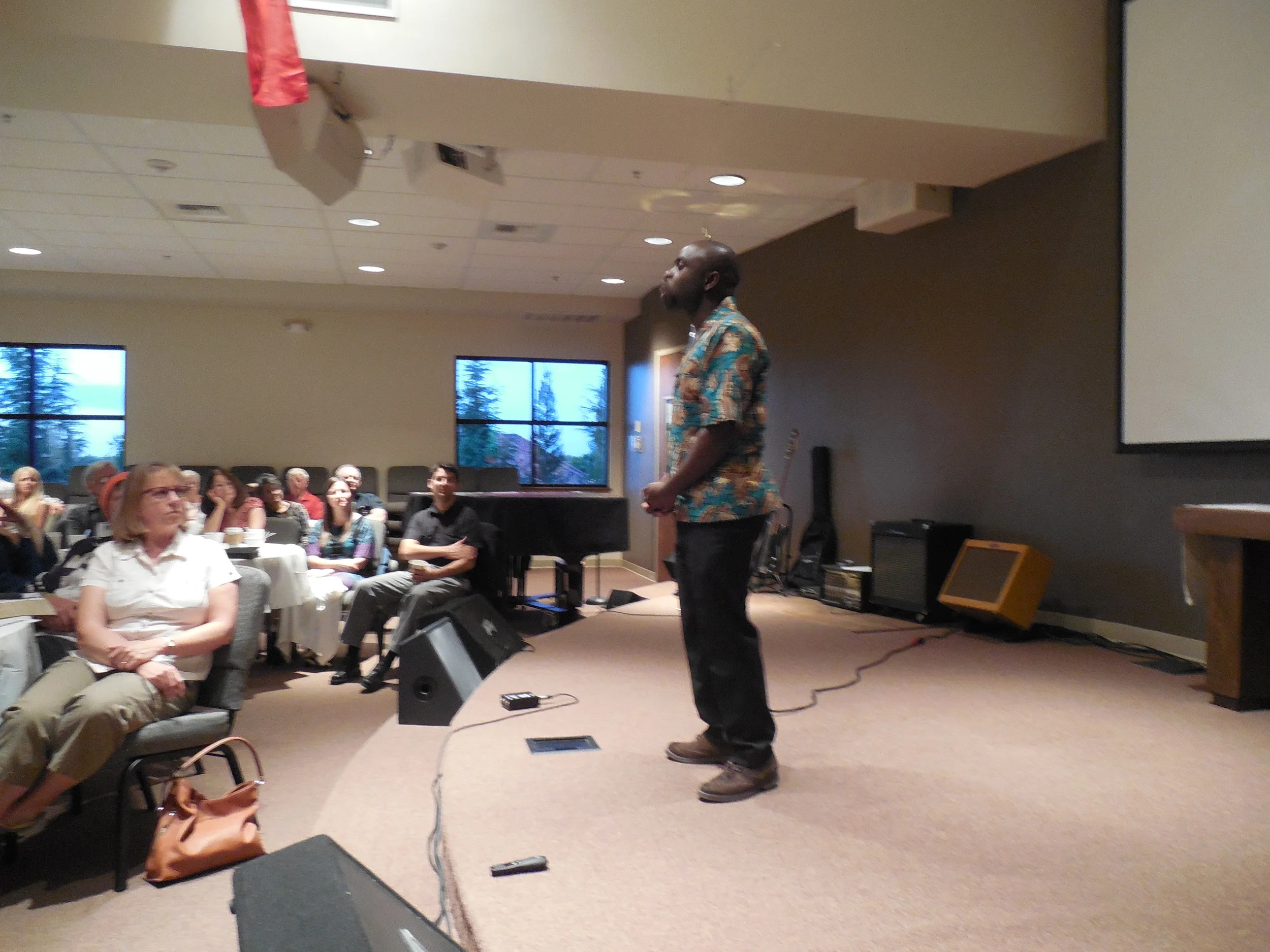Mulenga sharing the testimony of God’s faithfulness in his life with East Parkway Church in Sacramento, California in March 2015.