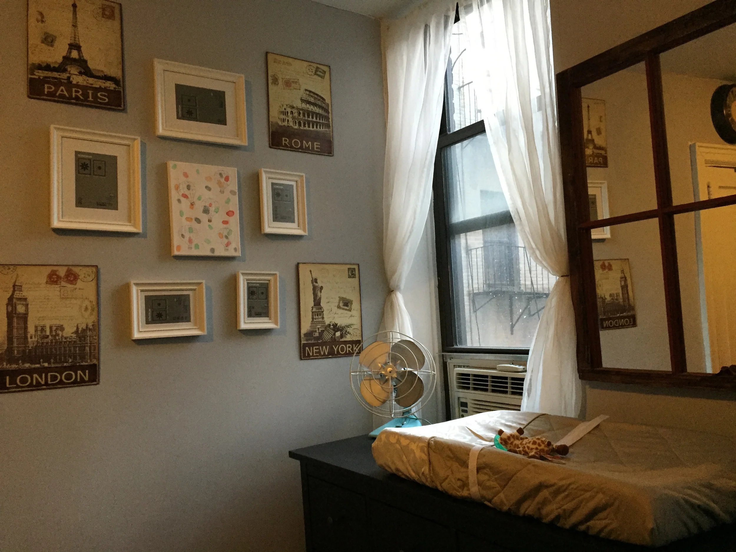 Future gallery wall, dresser and changing pad area.