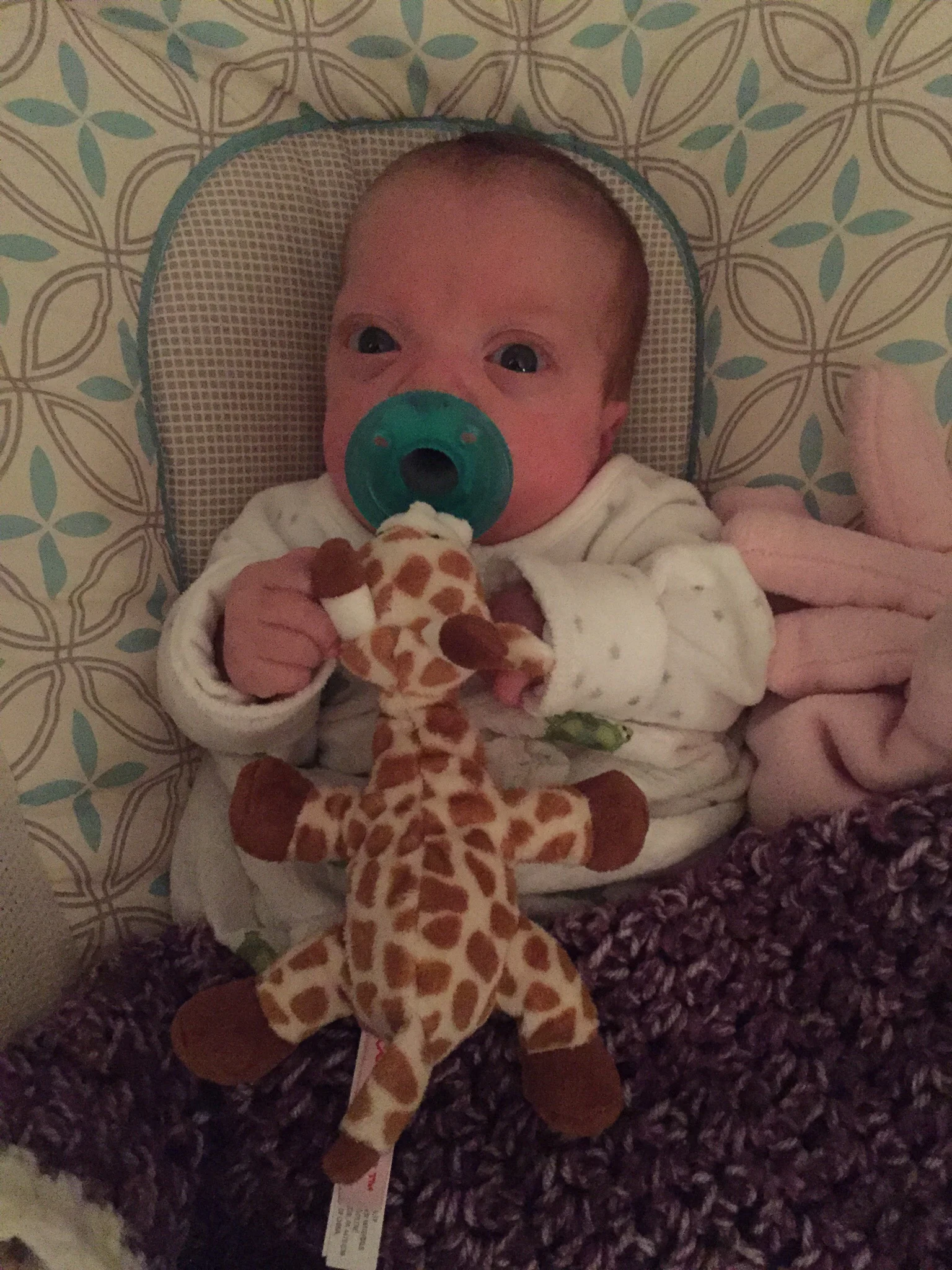 Snuggle time with her giraffe 