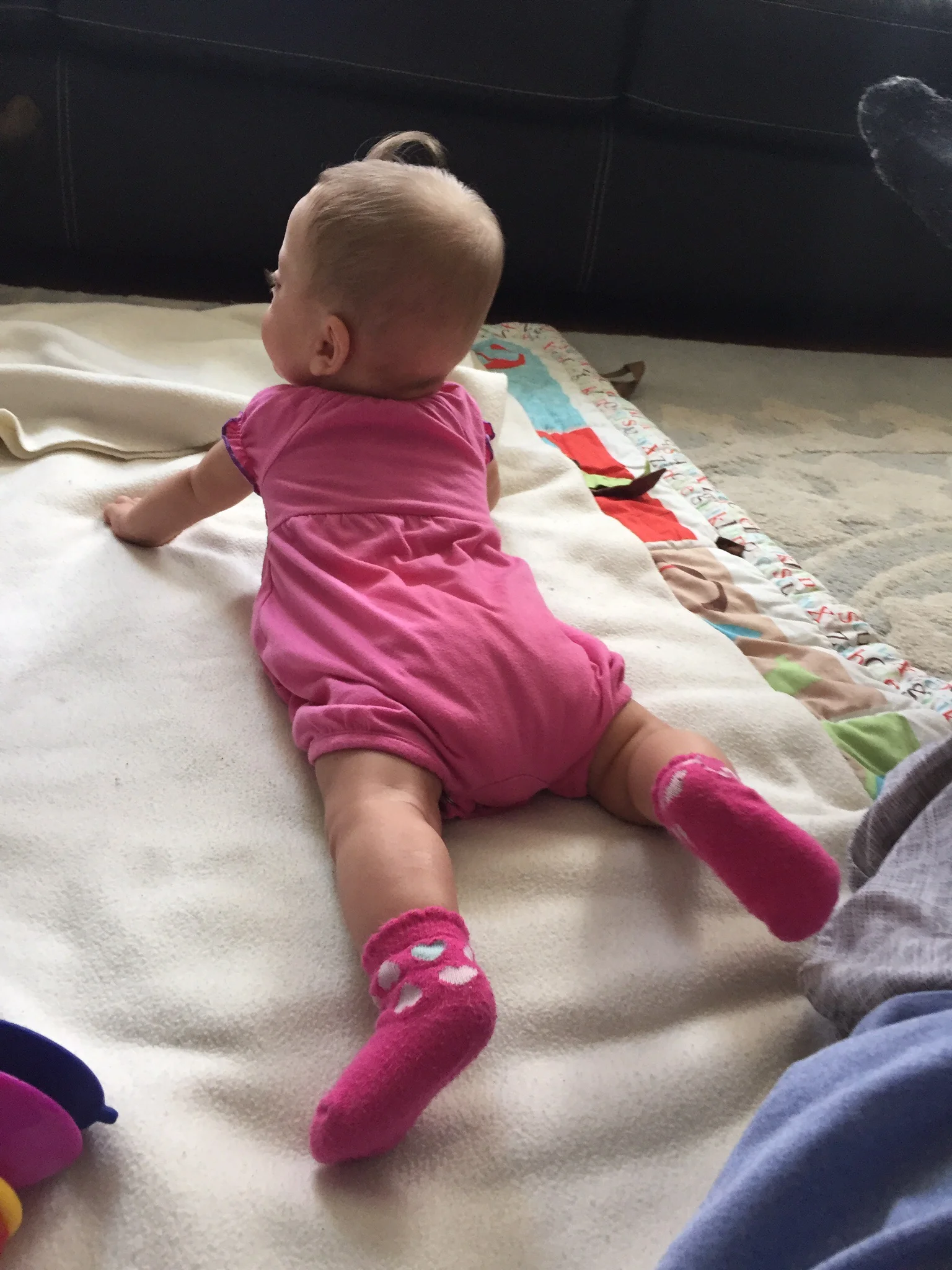 Rocking tummy time, strengthening her core!