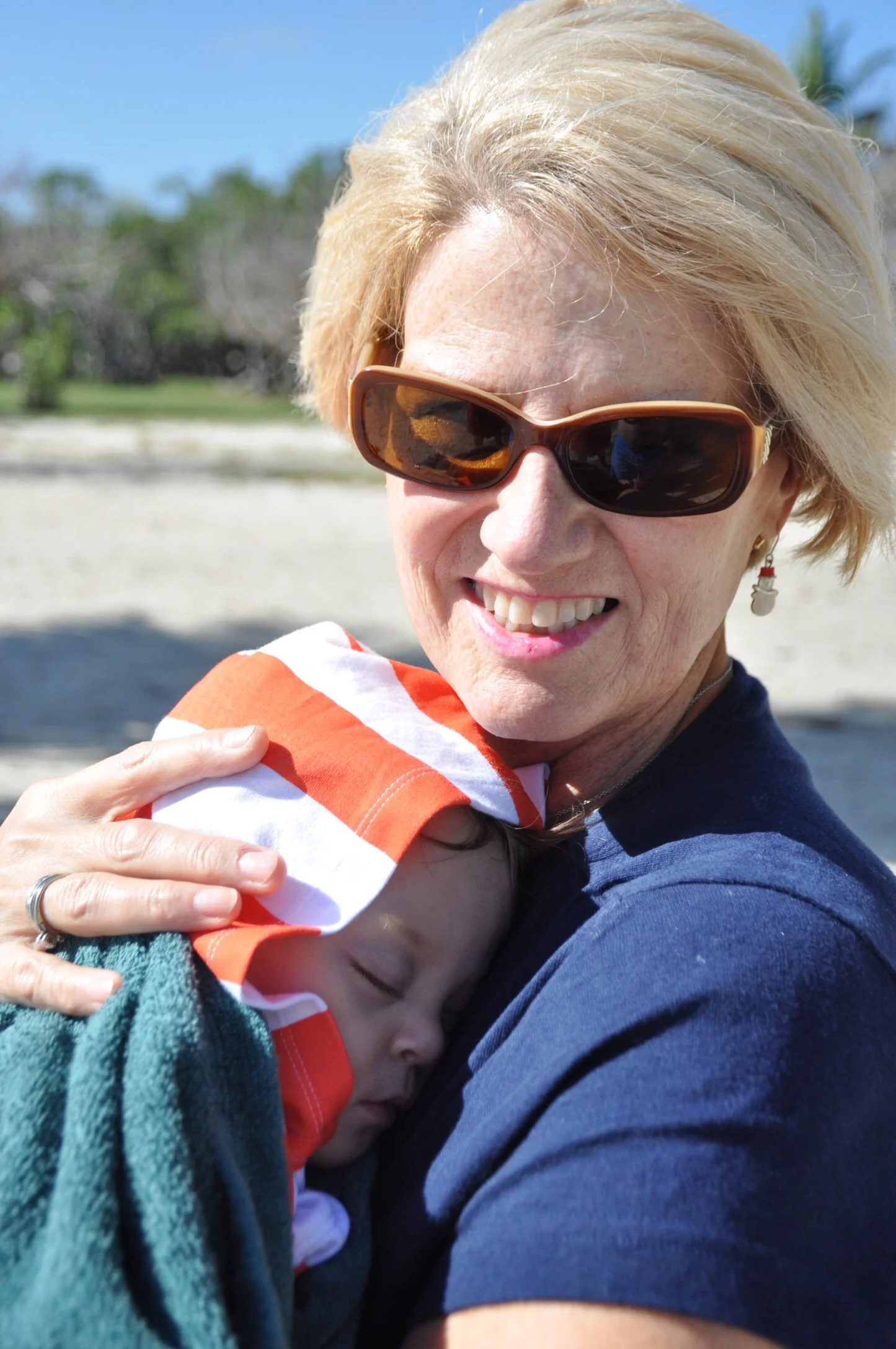 Beach naps are the best, especially with snuggles with her Great-Aunt Neise! 