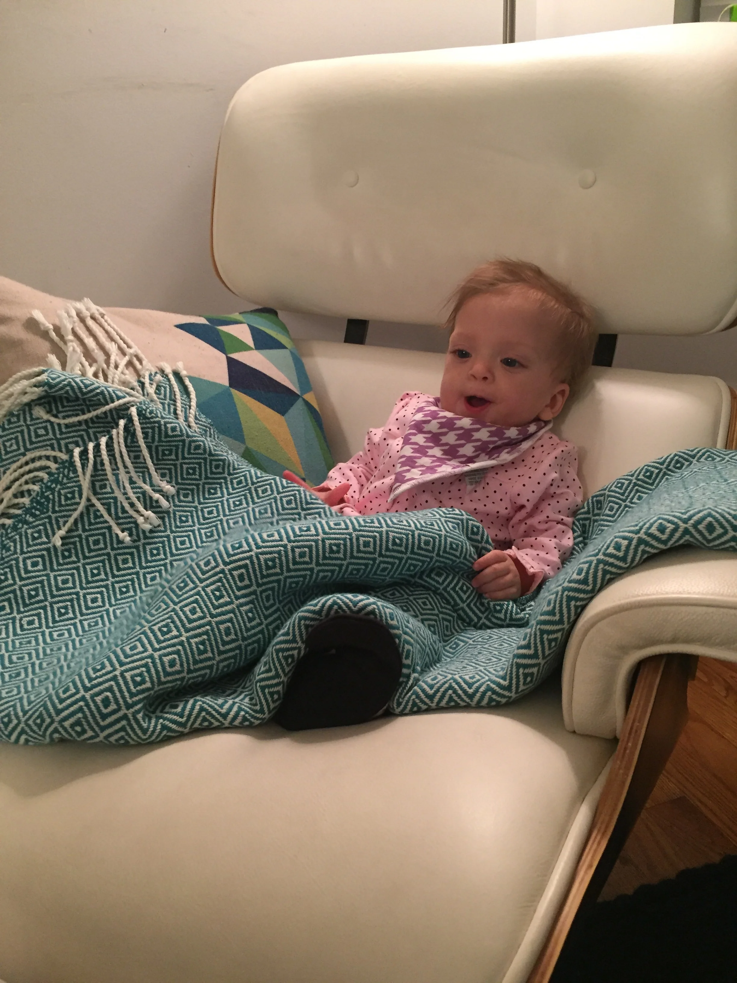 Living it up in Uncle Scottie's chair.