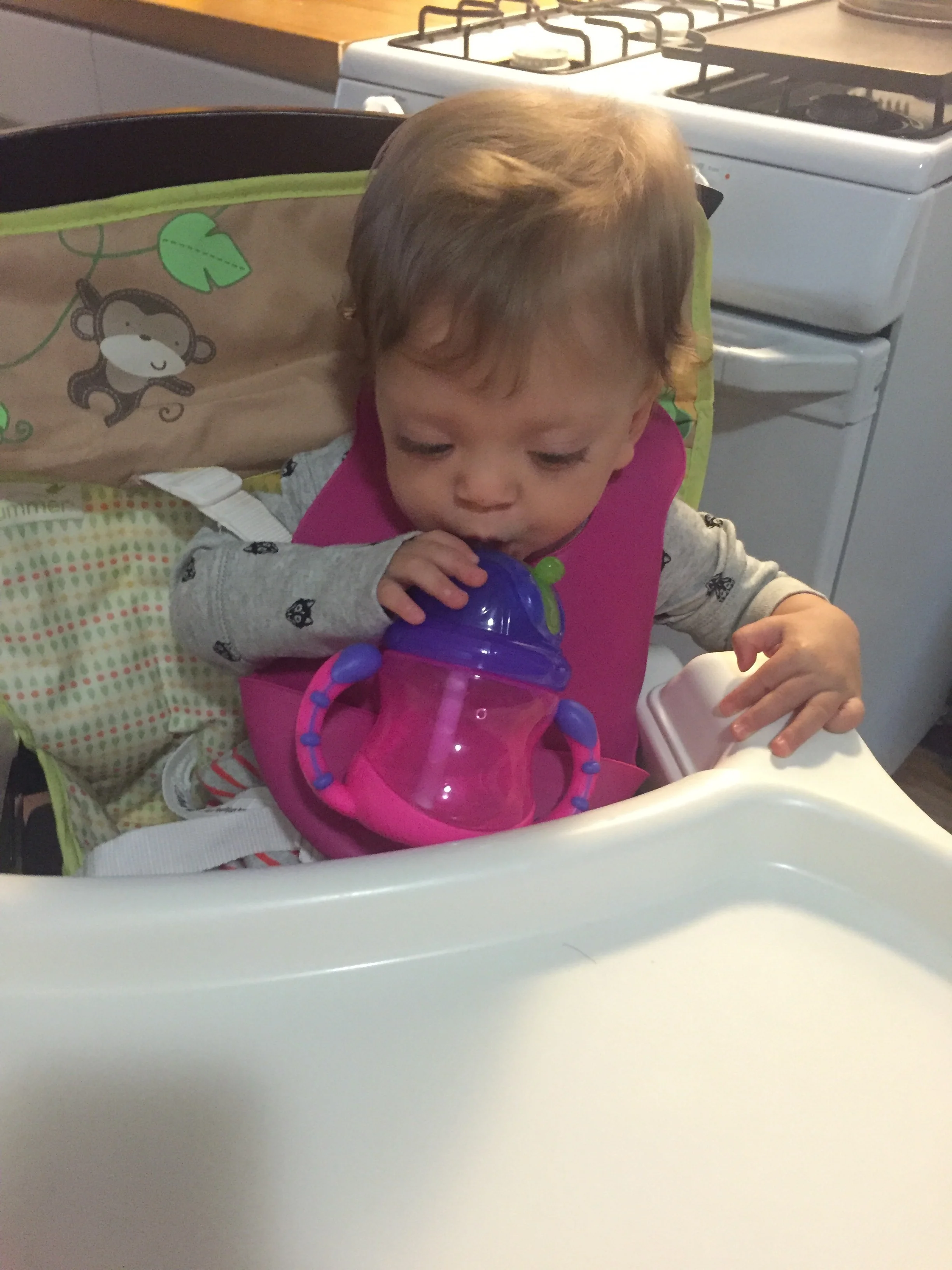 Learning to drink water.
