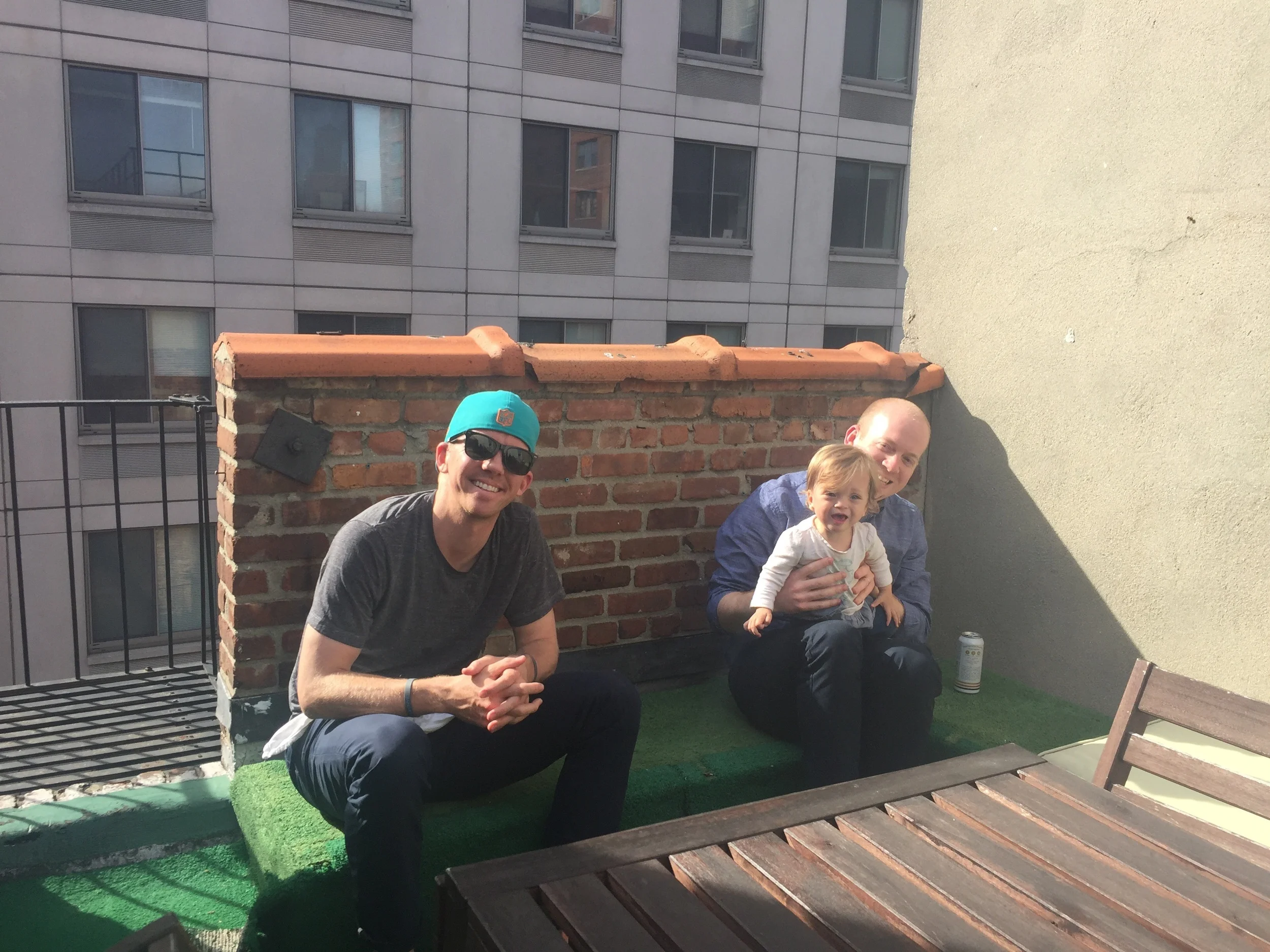 Starting to get warmer. Rob, Uncle Scottie and Lucie enjoying some sun.