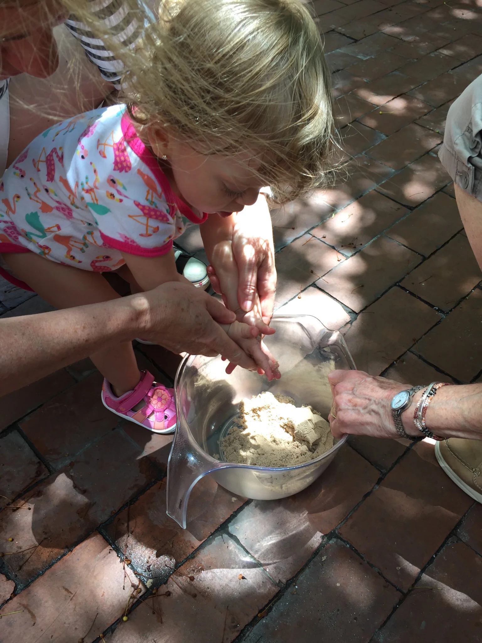 Playing with sand during a session.