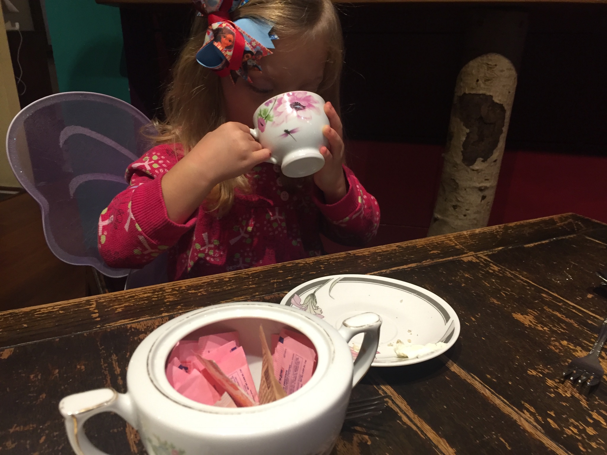  Enjoying tea over brunch at Alice's Tea Cup. 