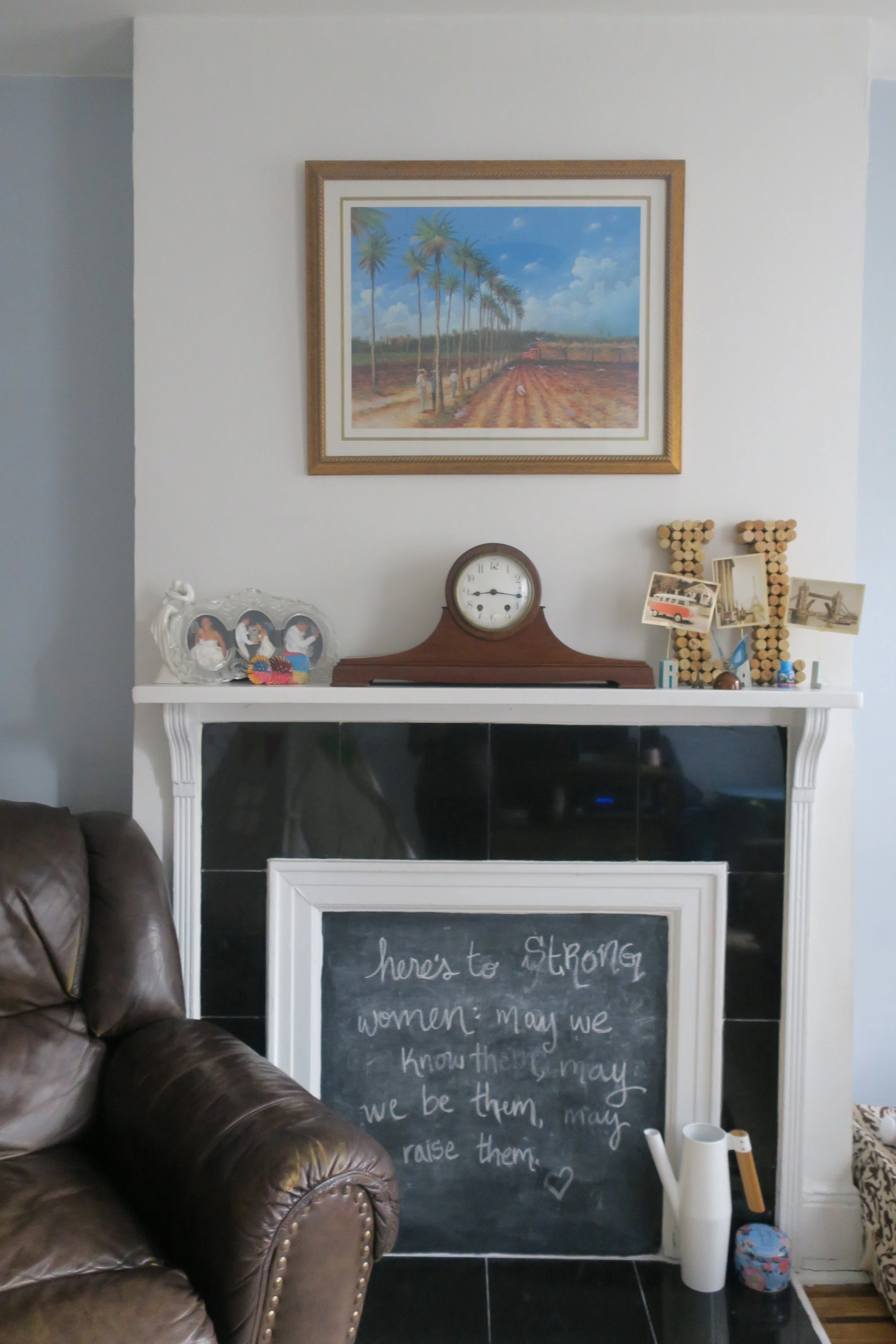  Love changing the chalkboard with the seasons. This was in honor of International Women's Day and Women's History Month! The clock is a family heirloom from Robby's grandparents. The painting is of the town of Aguirre, Puerto Rico where my Grandma L