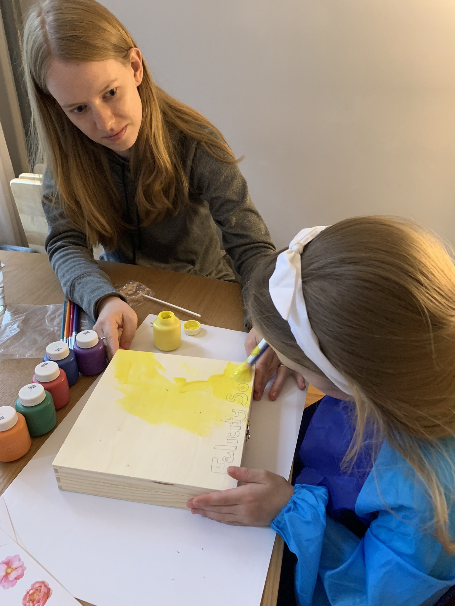 Decorating a memory box to hold pictures of Felicity from her time in the NICU