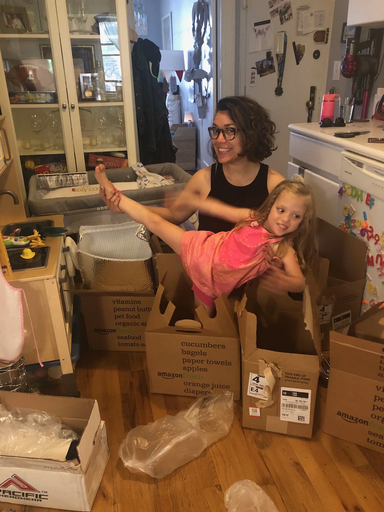 Lucie liked getting to show Titi Eli how we get our groceries every week