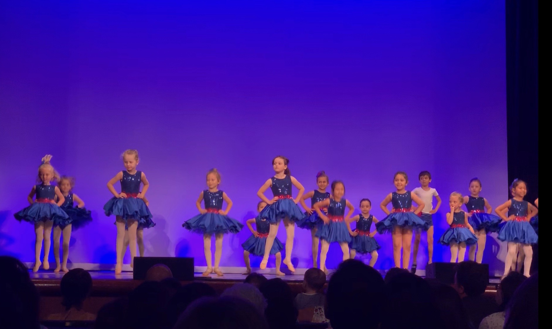 Lucie was SO brave on stage. She was the youngest dancer in the whole program that afternoon and spent her time on stage smiling at the audience, mostly standing still, and happily switching rows on cue.
