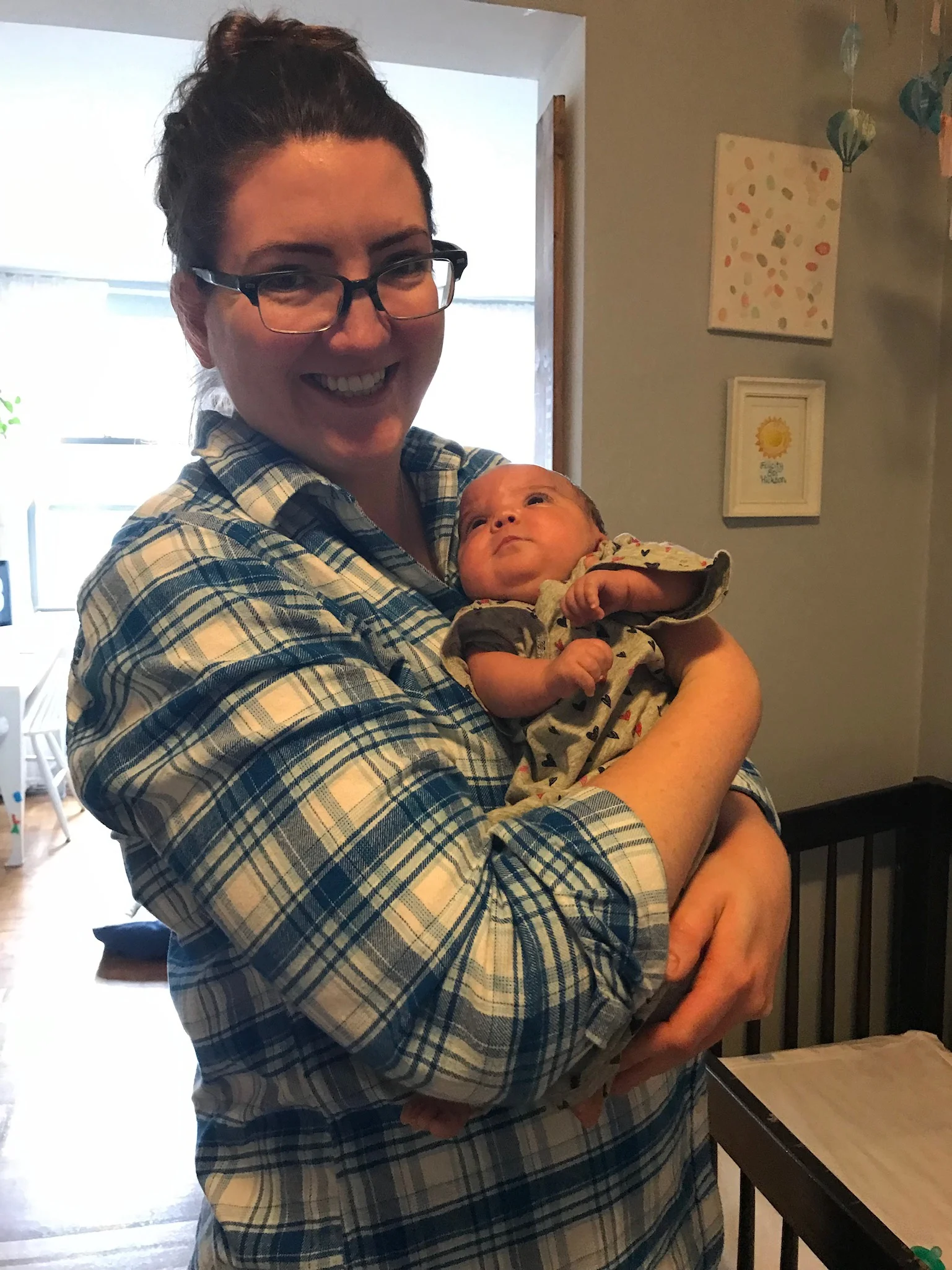 So cozy in her favorite nurse’s arms