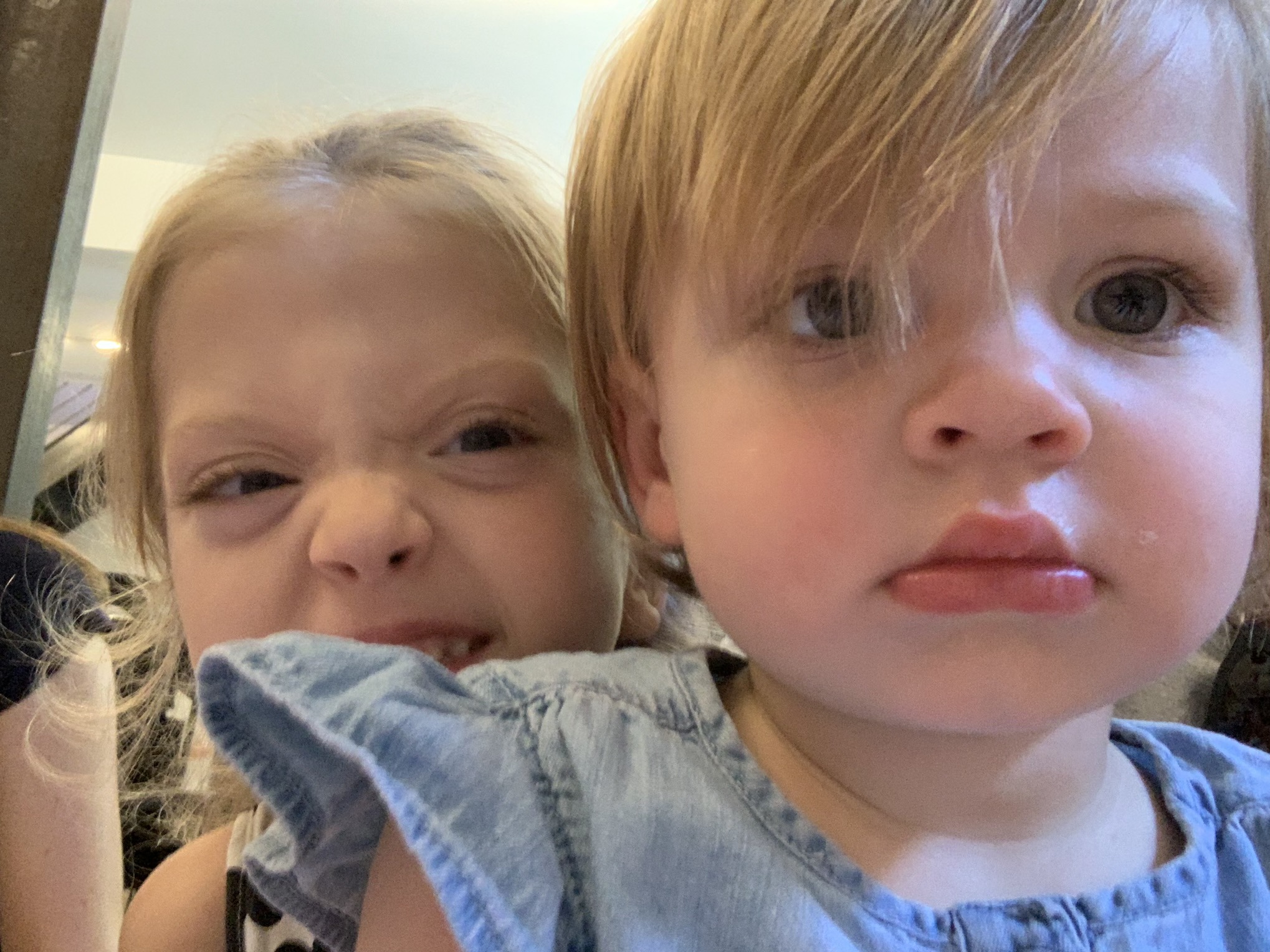Two city girls at story time in one of our favorite cafes.