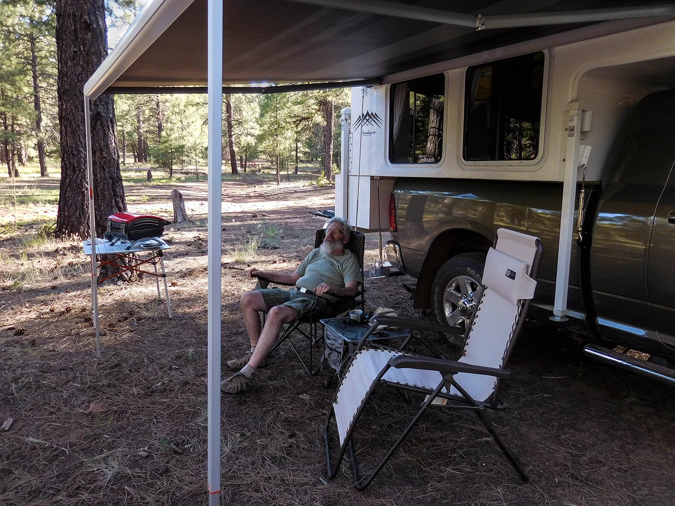 Joni catches me asleep; easy to do in a peaceful forest.