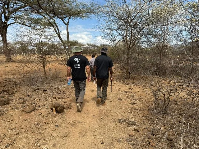 Mark and Sam walk the proposed pipeline route through elephant territory